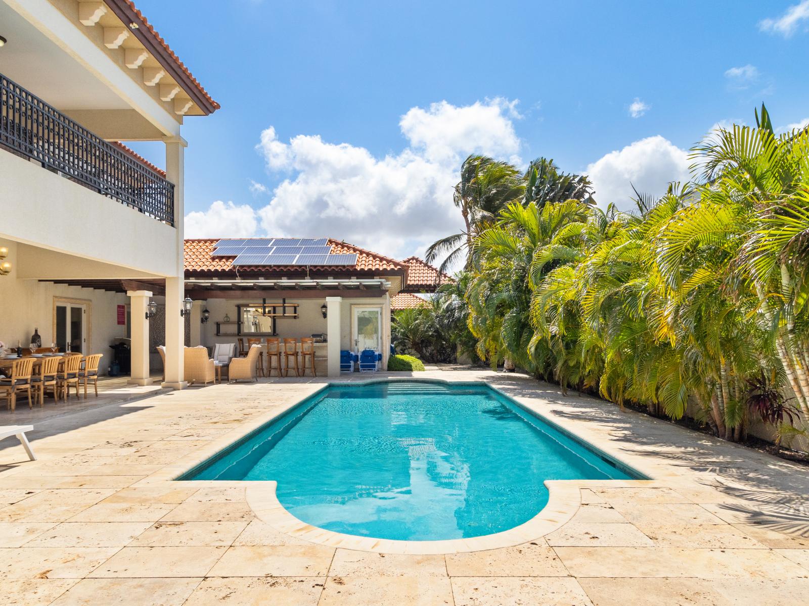 Splendid Private Pool of the Villa in Noord Aruba - Cosy beach chairs available - Dive into refreshing poolside escape - Immerse yourself in the cool elegance of our pool - Experience ultimate relaxation in our poolside paradise