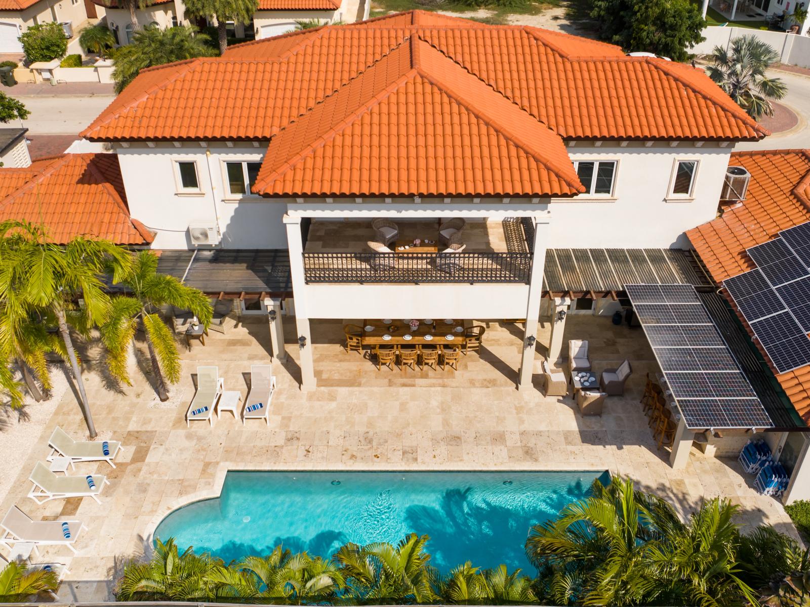 Poolside and balcony, creating the perfect setting for lounging and enjoying the scenery.