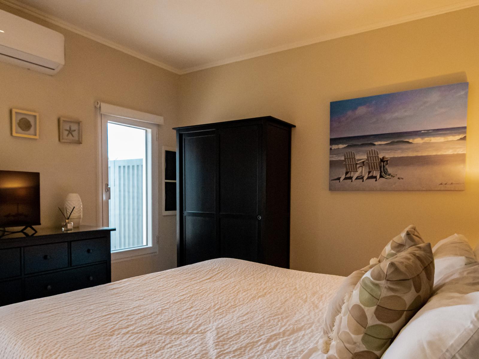 Embrace comfort and privacy in Bedroom 4, complete with its own attached bathroom. Enjoy the convenience of your own personal retreat, where relaxation and rejuvenation are just steps away.