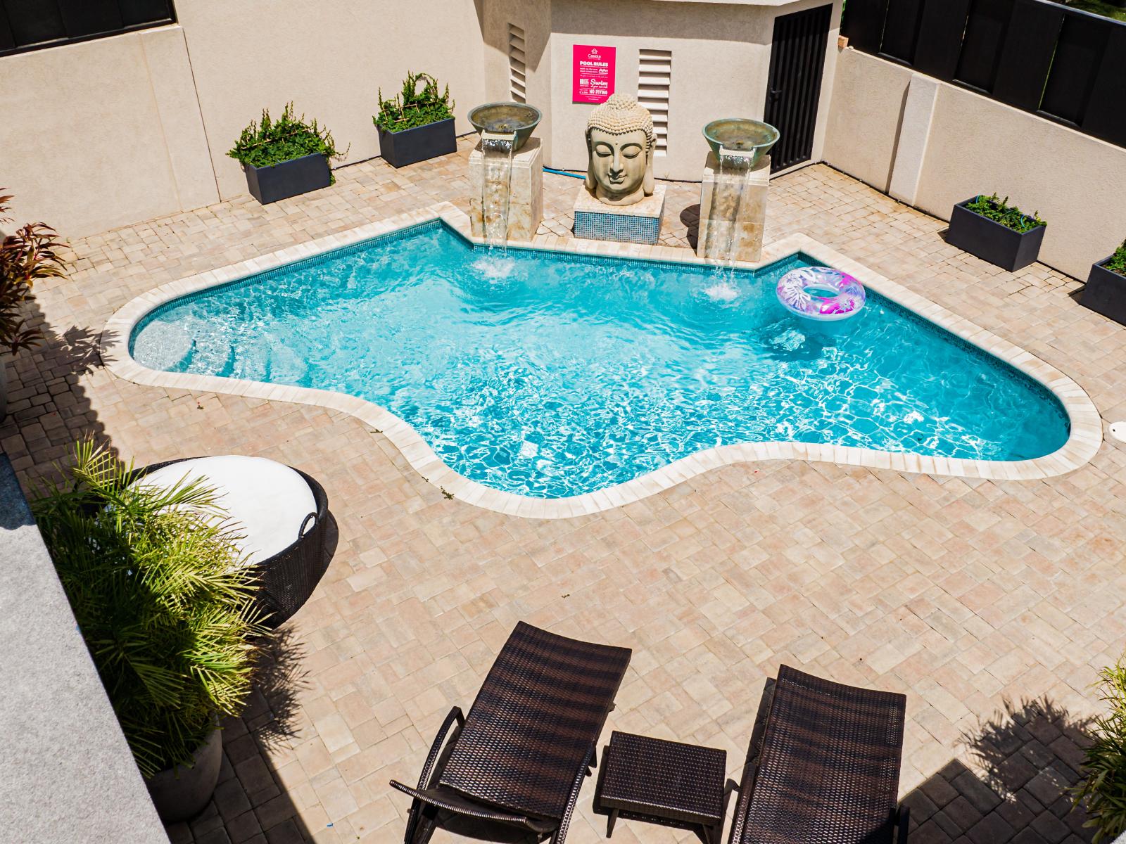 Delight in the tranquil ambiance of water fountains surrounding our pool, adding elegance and serenity to your outdoor retreat. Let the soothing sounds and sights transport you to relaxation and rejuvenation.