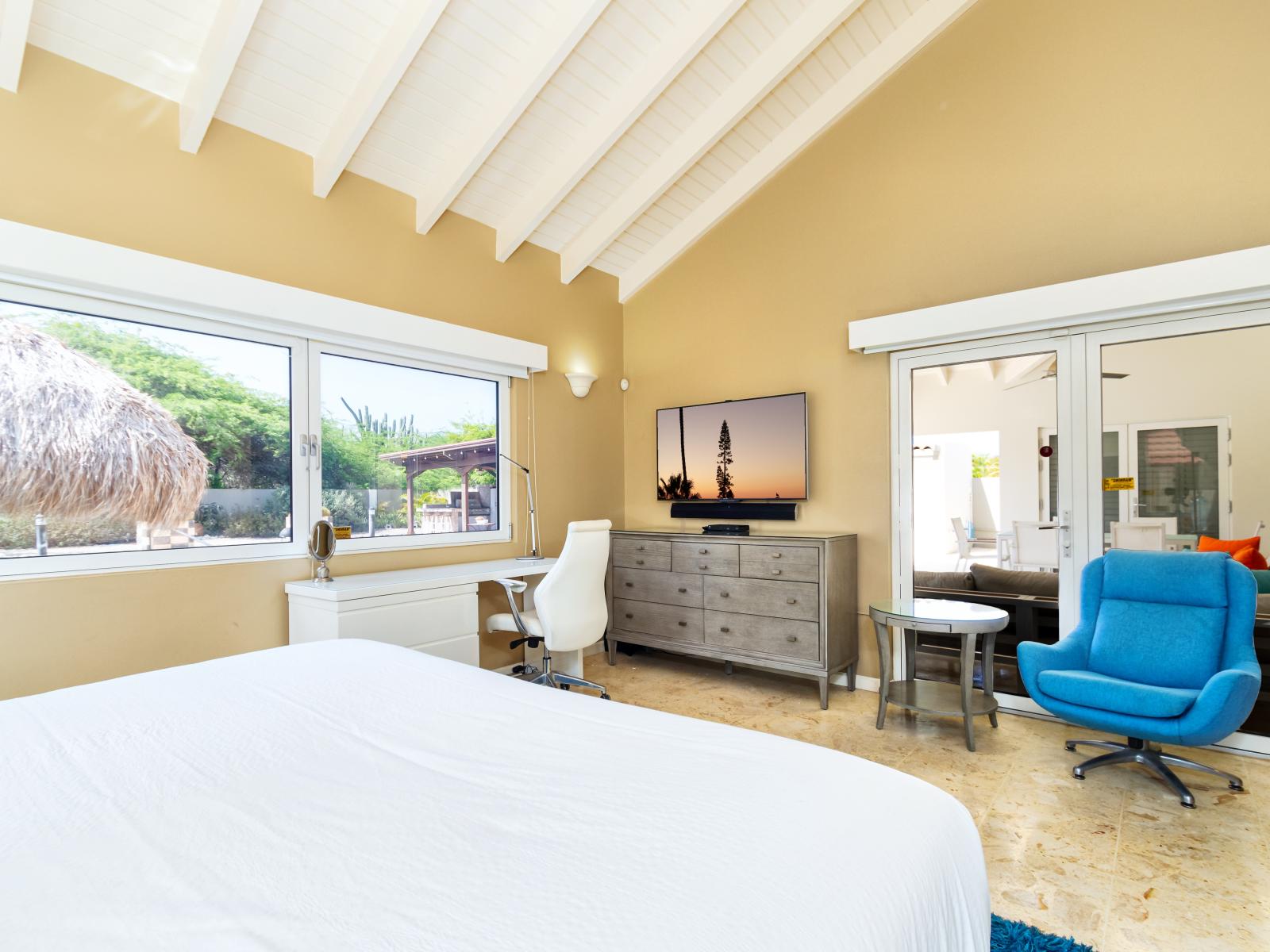 Palatial Bathroom of the Villa in Noord Aruba - Smart TV and Netflix - Ample natural light highlighting the elegant tilework - King Size Comfy bed  - Dedicated Workspace