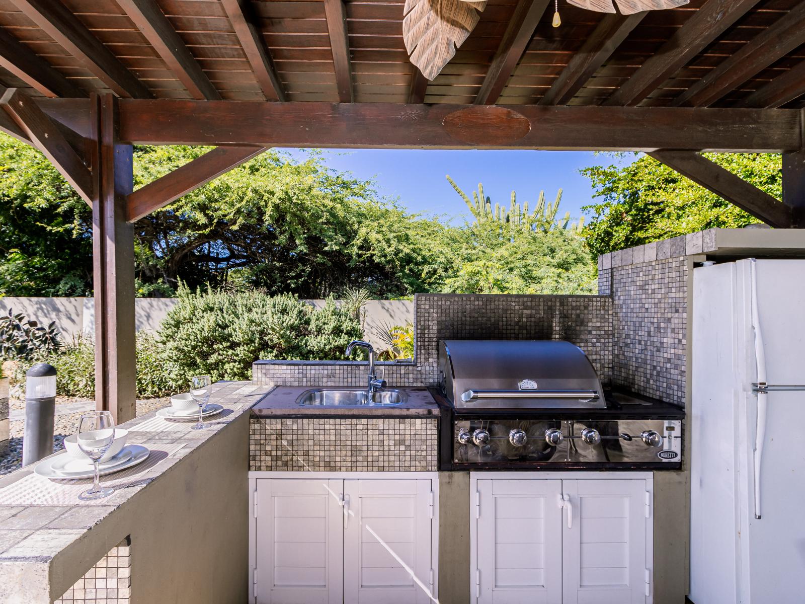 Outdoor kitchen with BBQ Grill - Have fun gathering in outdoors - Refreshing environment - Experience outdoor bliss with our charming settings