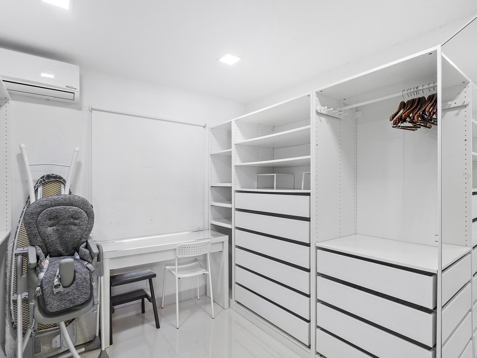 Stay organized with ease in the Master’s bedroom walk-in closet, designed for maximum storage and style.