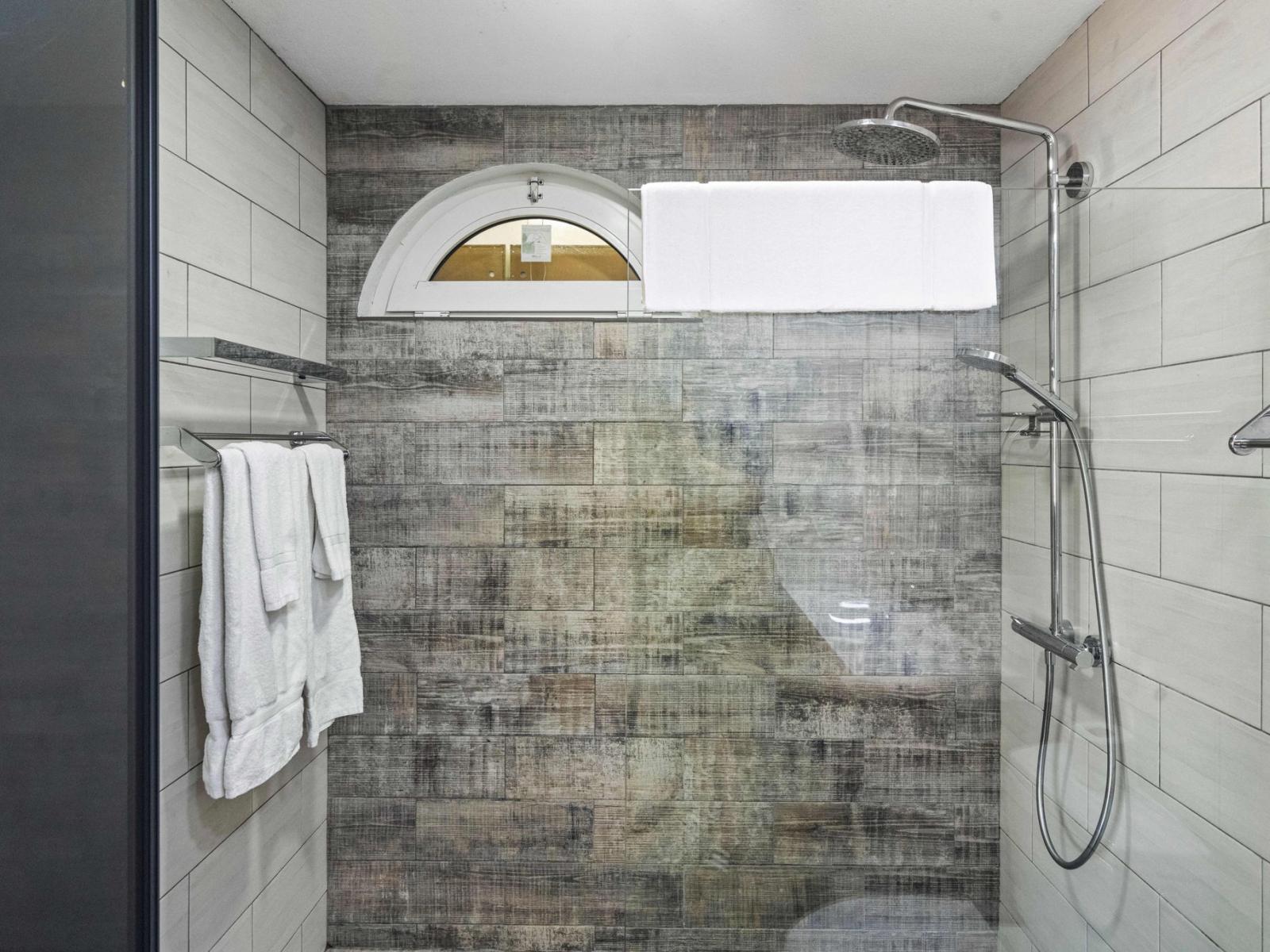 Step into serenity: the Master’s bedroom ensuite bathroom offers a stylish walk-in shower.