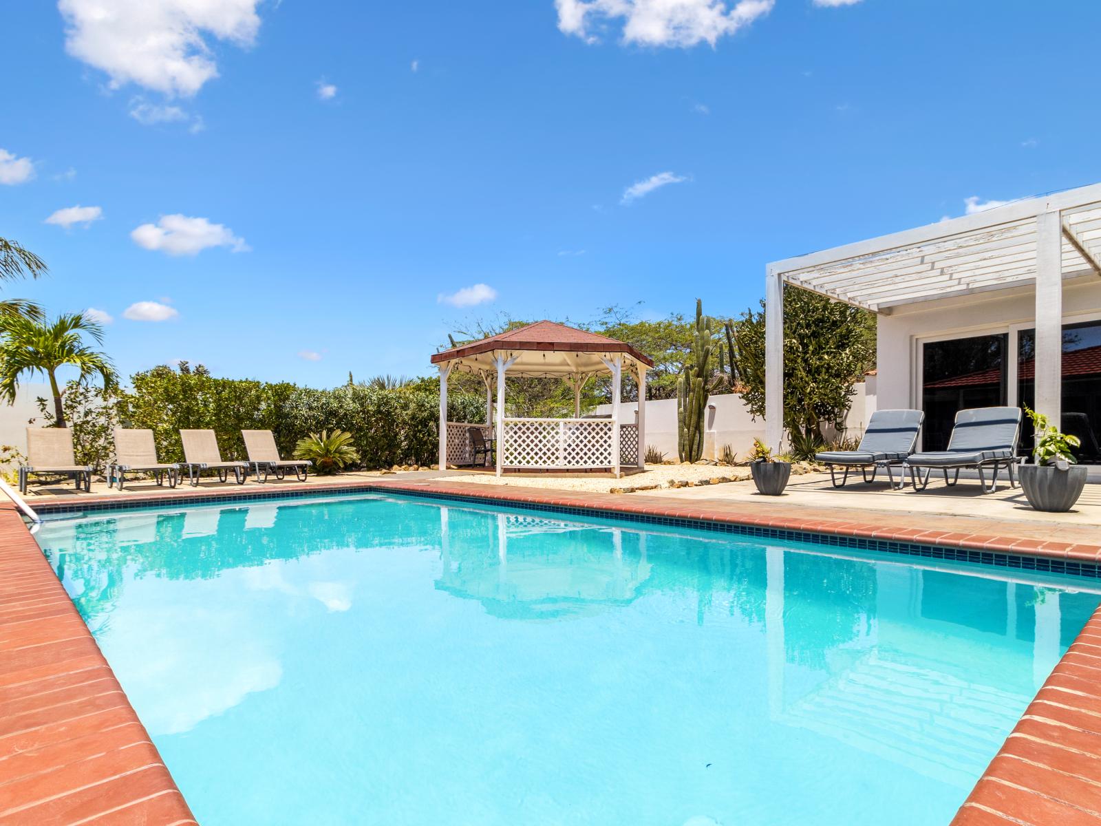 An abundance of greenery surrounding the home