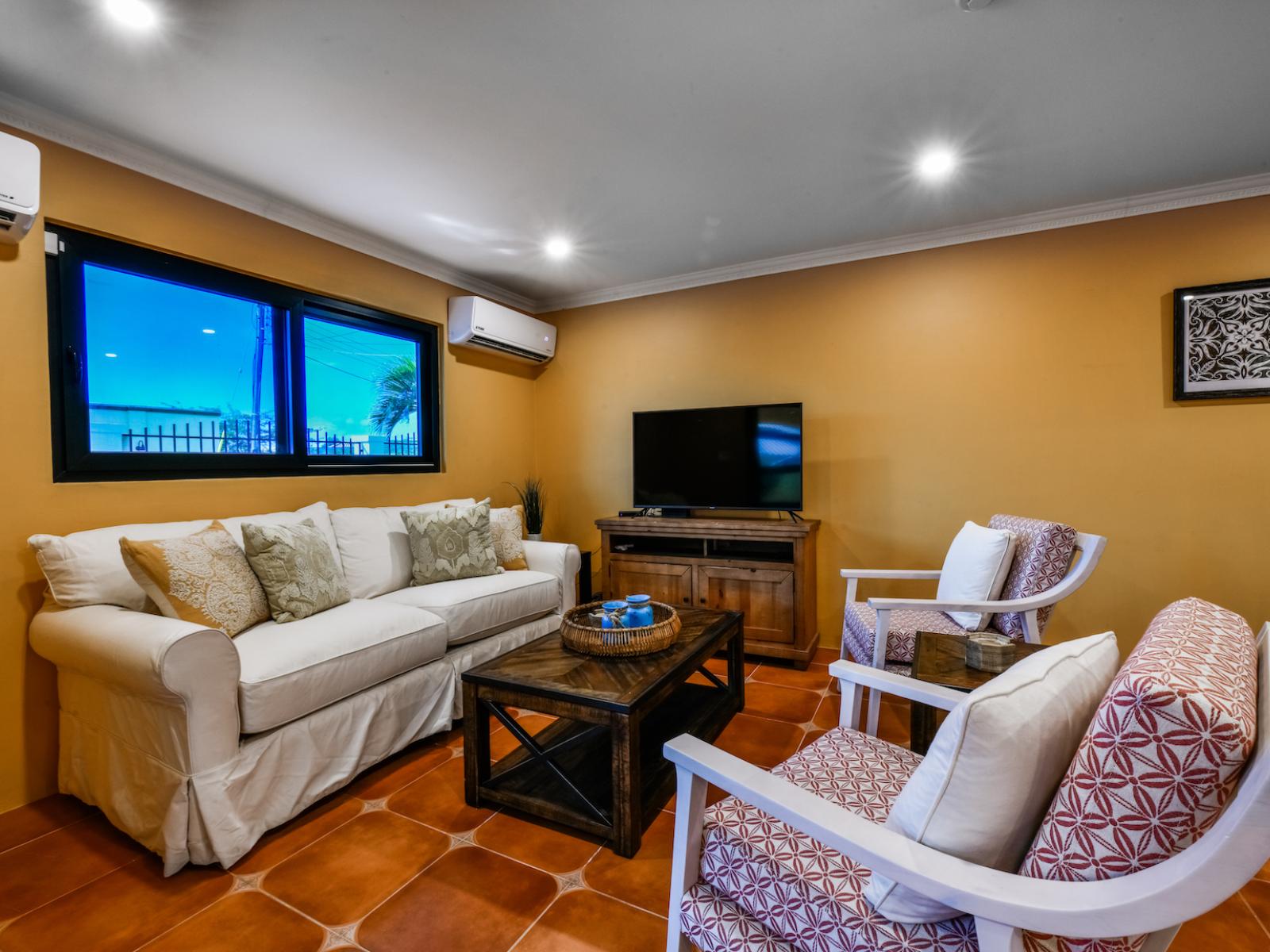 Entertainment meets comfort: our living area is your haven for leisure and relaxation