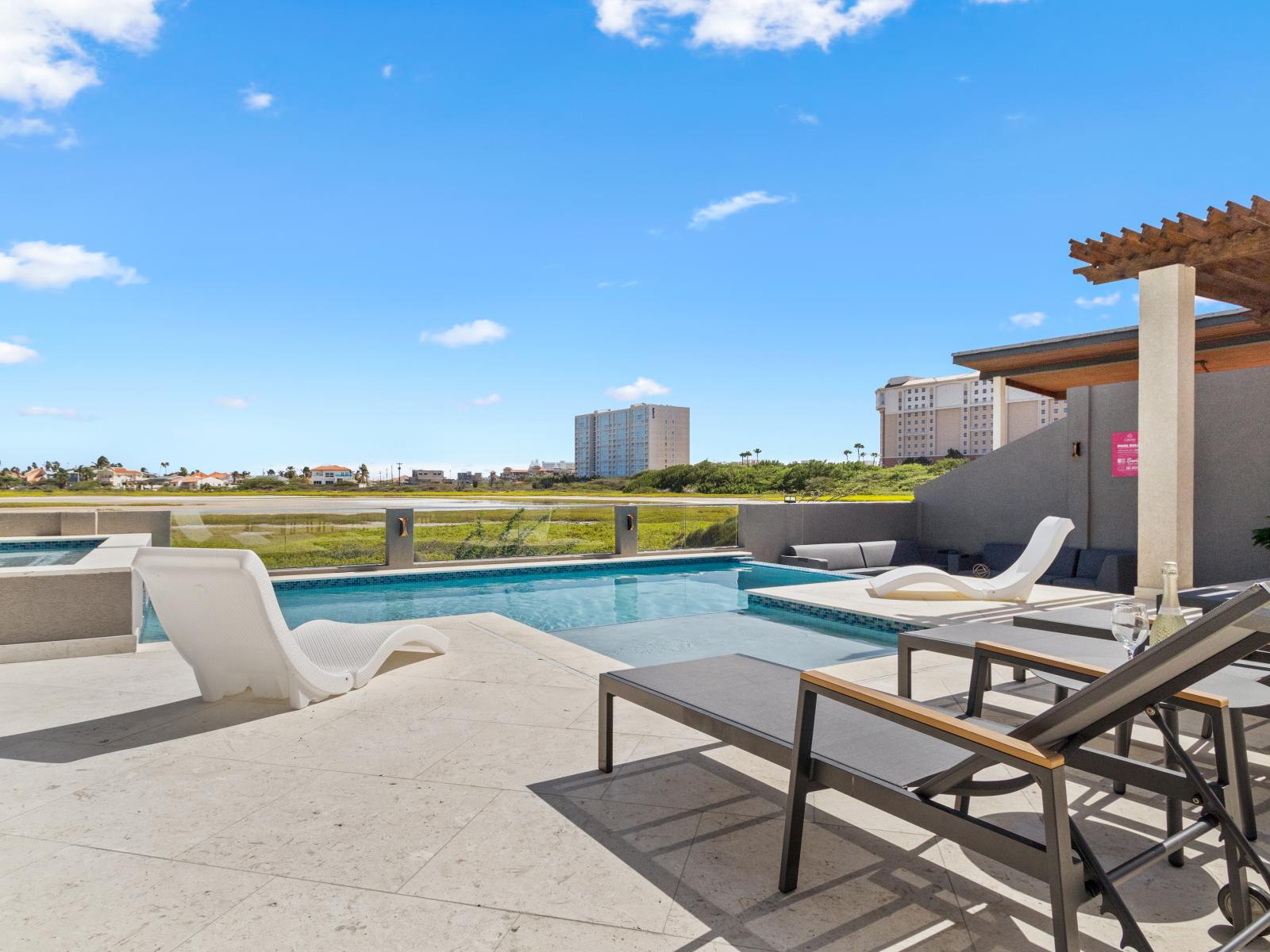 Dive into paradise in our pool area, offering breathtaking views of the picturesque Saliña and swaying palm trees, creating an unforgettable backdrop for your relaxation and enjoyment.