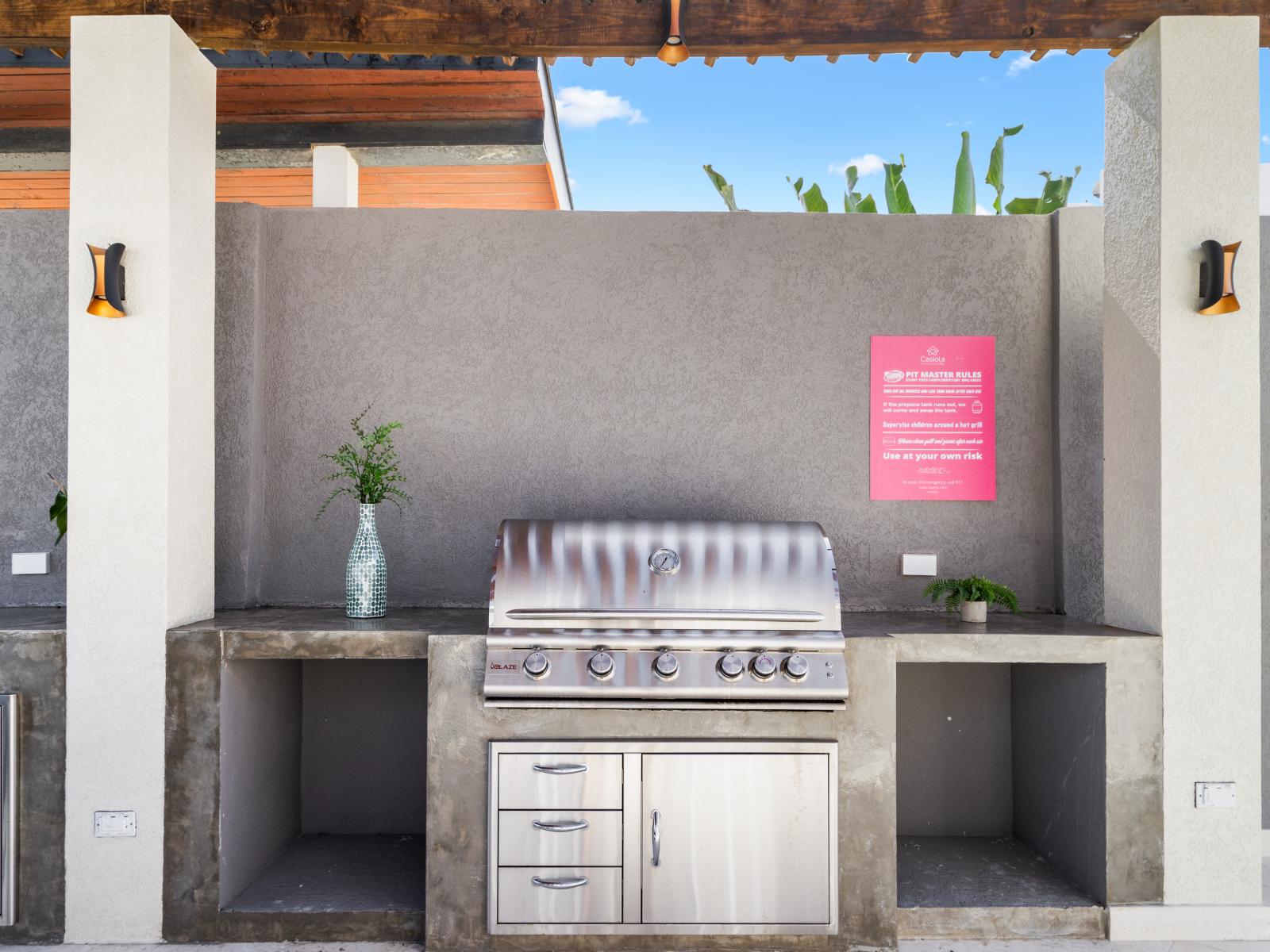 Fire up the flavor with our outdoor kitchen featuring a BBQ grill, where culinary adventures await amidst the backdrop of fresh air and good company.