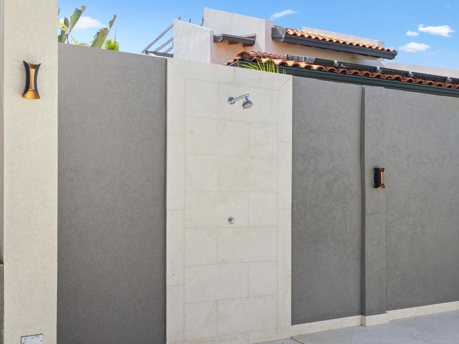 Rinse off under the open sky in our invigorating outdoor shower, offering a refreshing way to rejuvenate after a day of fun in the sun.