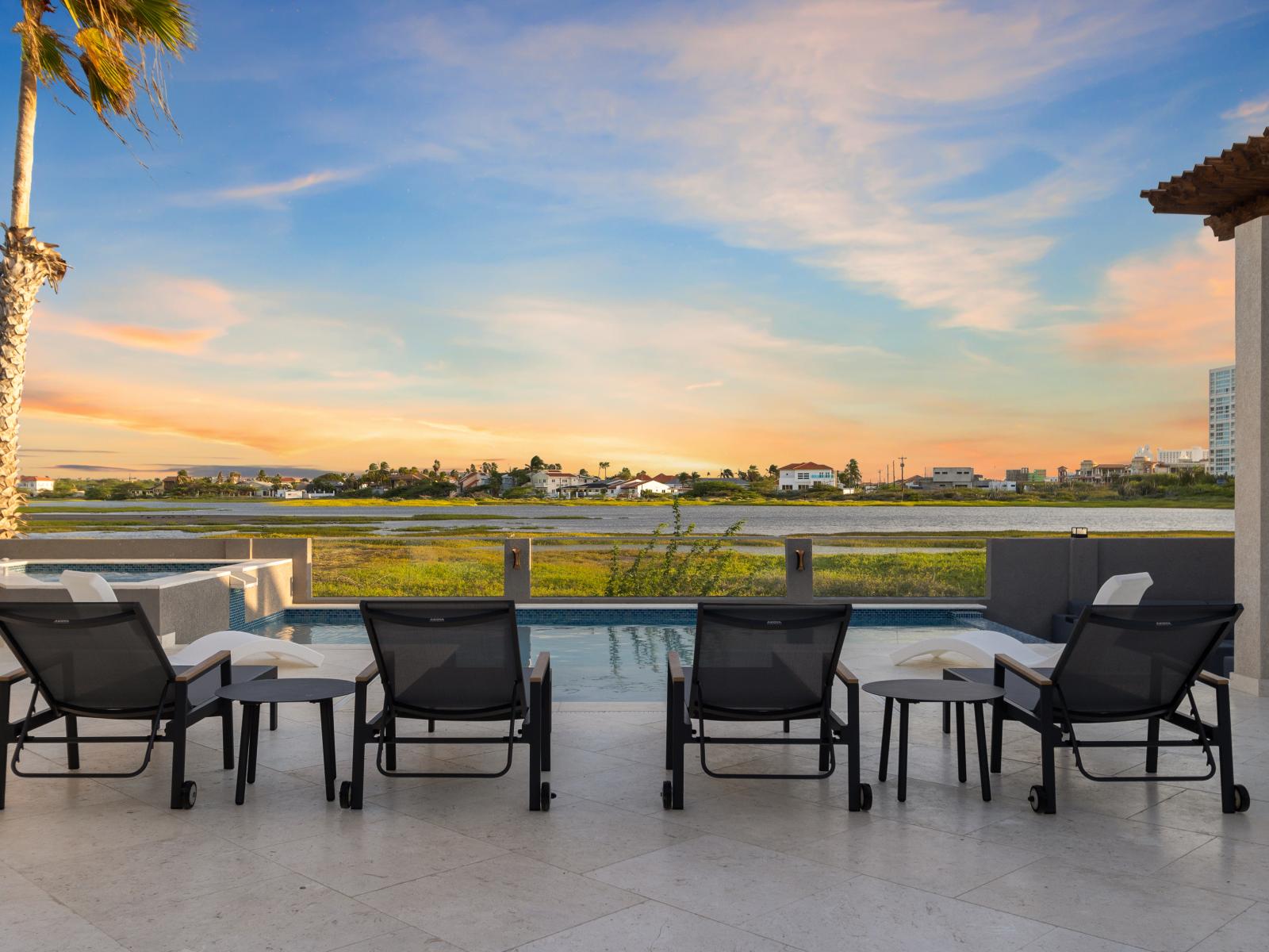 Take in the Cityscape: Unwind in our cozy lounge chairs while soaking up breathtaking views of the city.