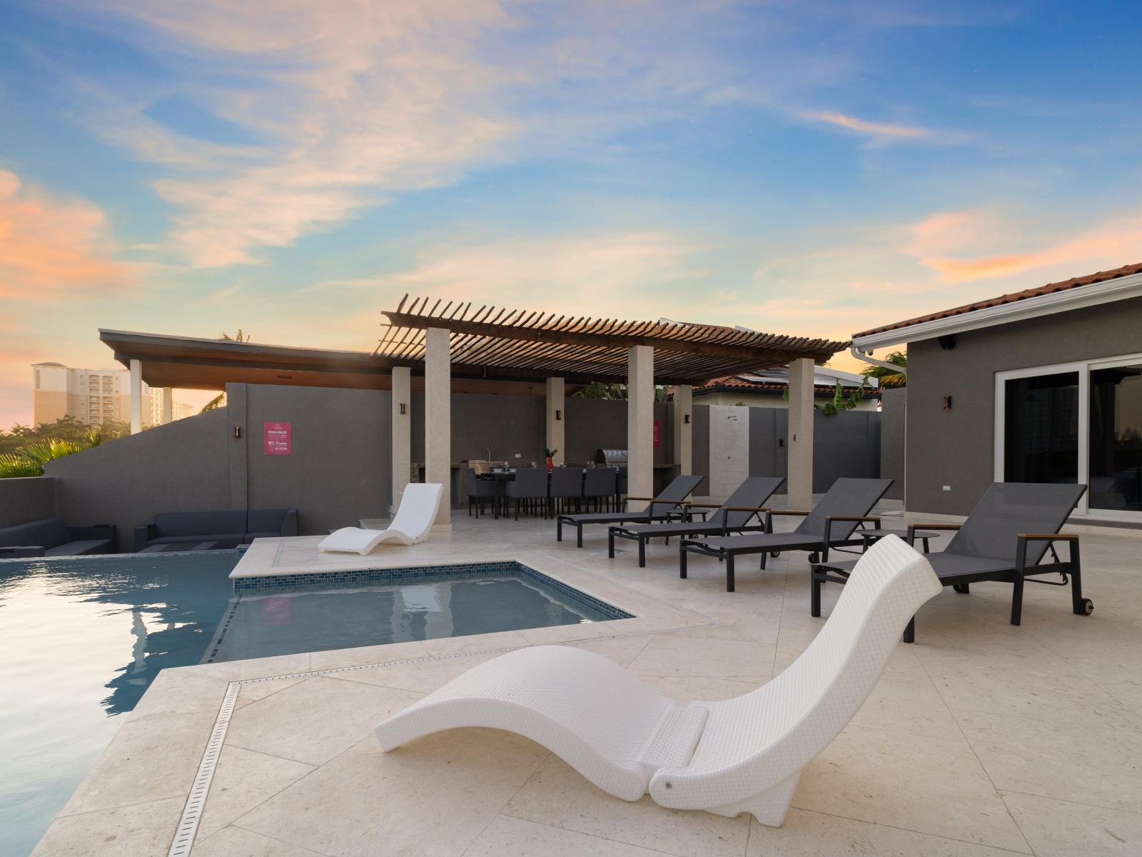 Poolside Comfort: Sink into relaxation on our inviting pool chairs, offering a serene oasis for soaking up the sun.