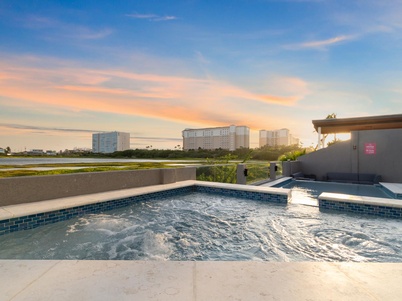 Bubbling Bliss: Experience pure relaxation as you sink into the soothing bubbles of our spa, a haven of tranquility in your retreat.