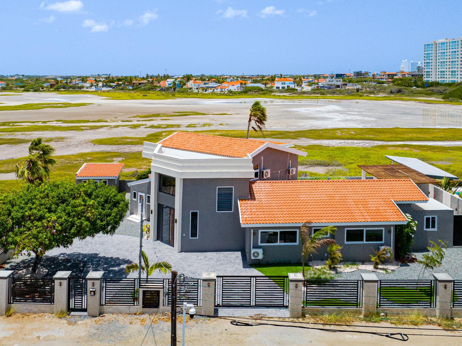 Elevated Serenity: Behold a panoramic vista of our home from above, showcasing stunning saliña views that epitomize tranquility and natural beauty.