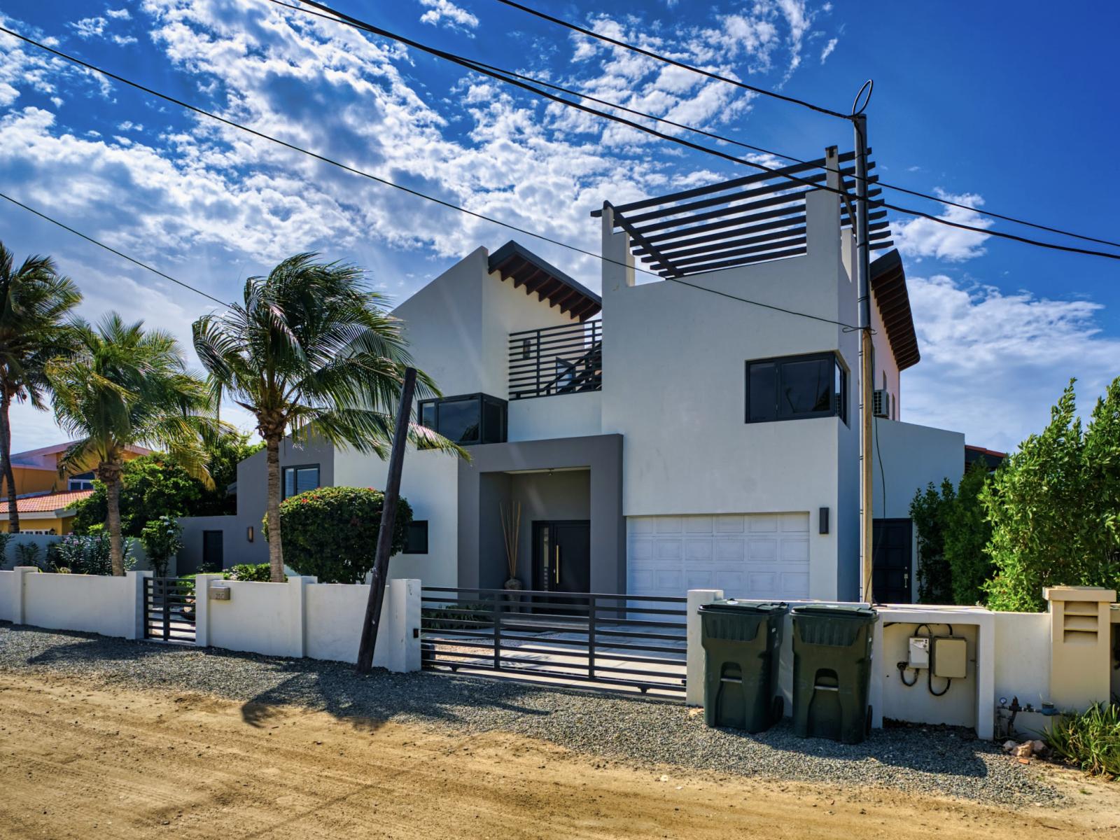 Front view of our charming villa, offering a welcoming and picturesque entrance.