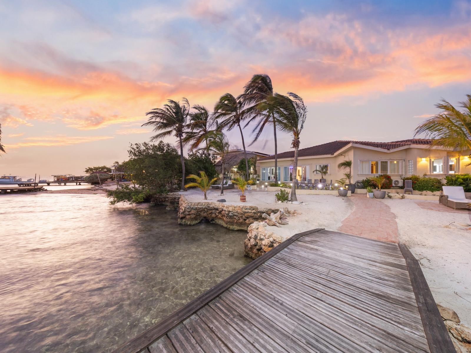 Insane ocean front villa with a private pier and outdoor kitchen