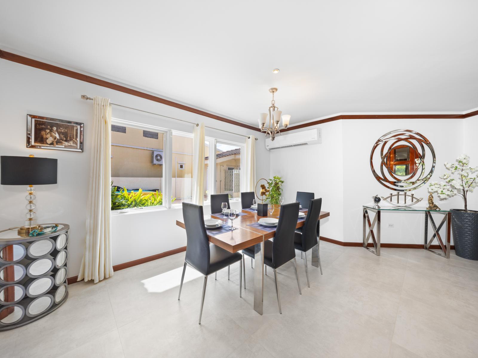 Charming Dining Area with a sleek dining table and comfortable chairs