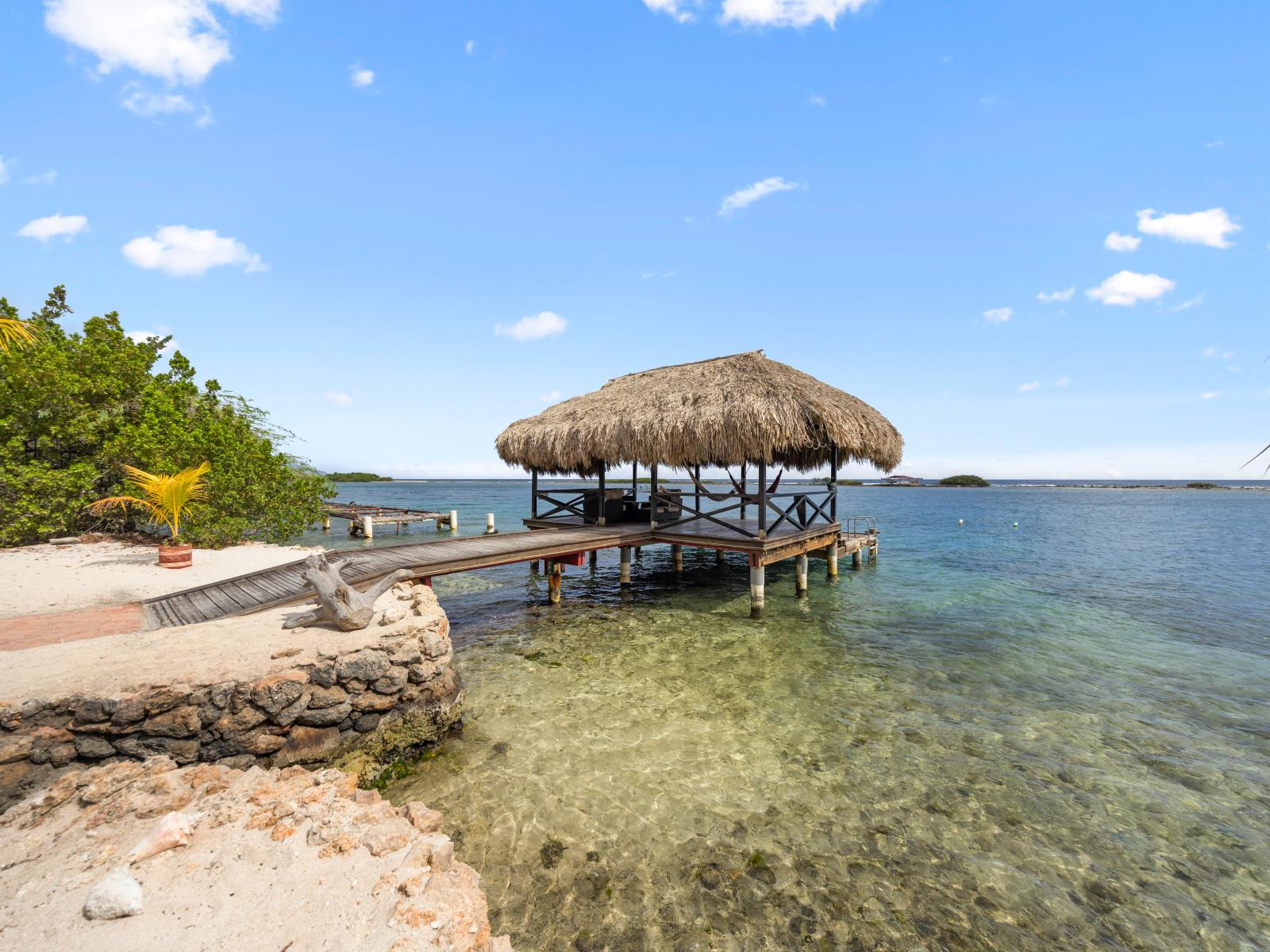 Experience waterfront luxury with our private pier extending into Aruba's turquoise waters. Whether casting a line, strolling leisurely, or soaking in panoramic views, our pier offers an exceptional experience.