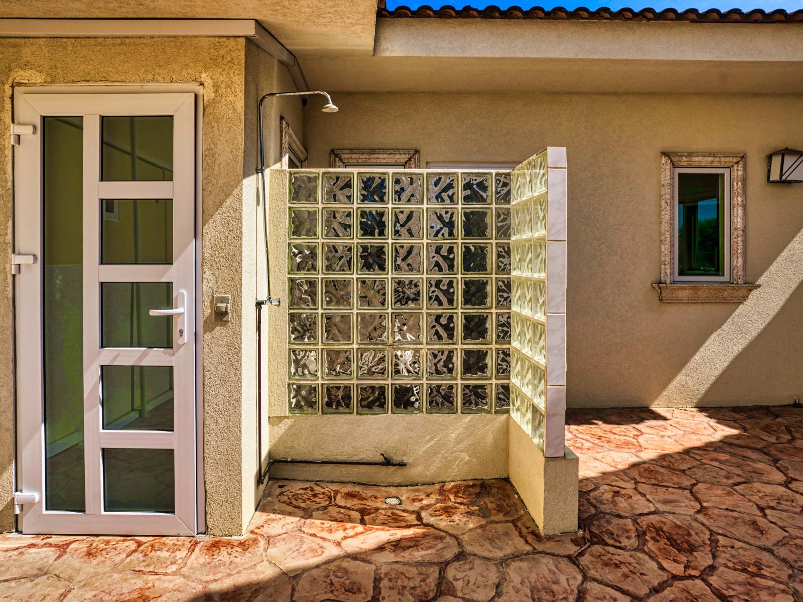 Rinse off the sand and salt in our refreshing outdoor shower, adding a touch of luxury to your beachfront experience. Step into this invigorating oasis to freshen up and rejuvenate after a day of fun in the sun.