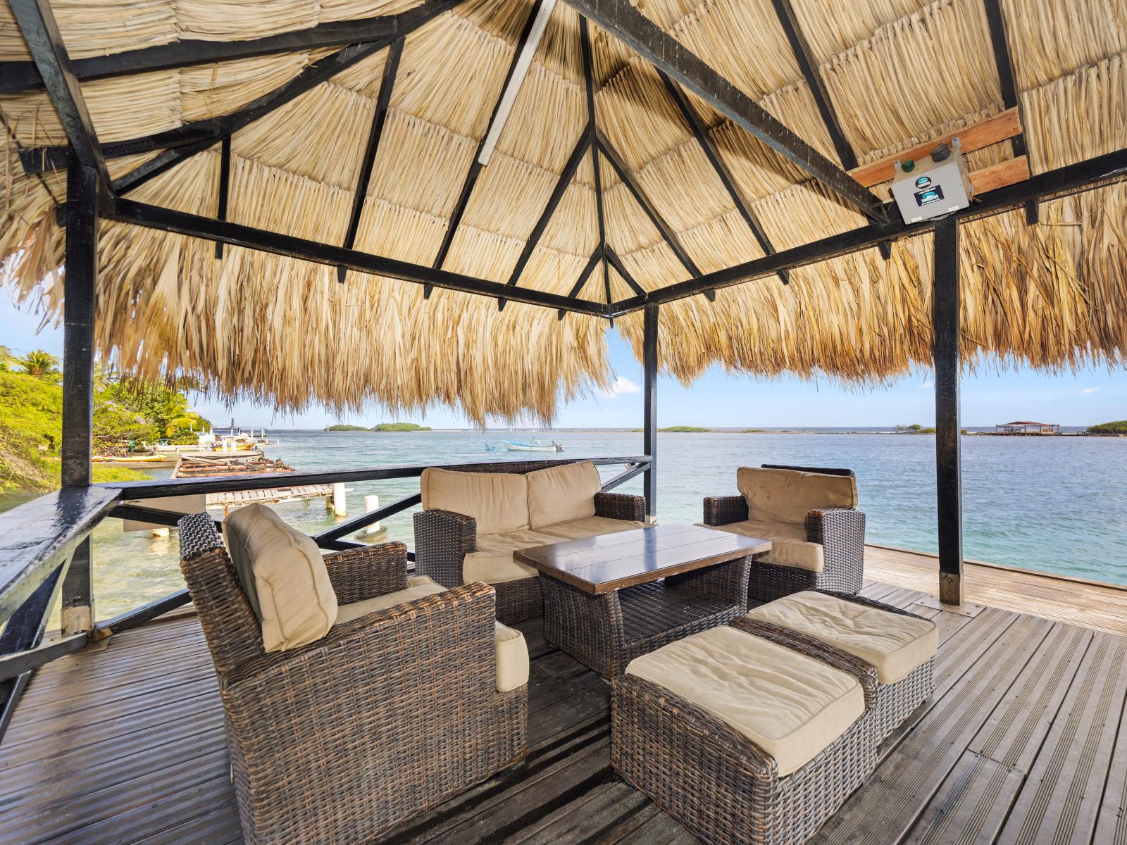 Nestled on our private pier, our cozy outdoor seating area invites you to unwind and soak in the scenic beauty that surrounds you, from morning coffee to sunset cocktails.