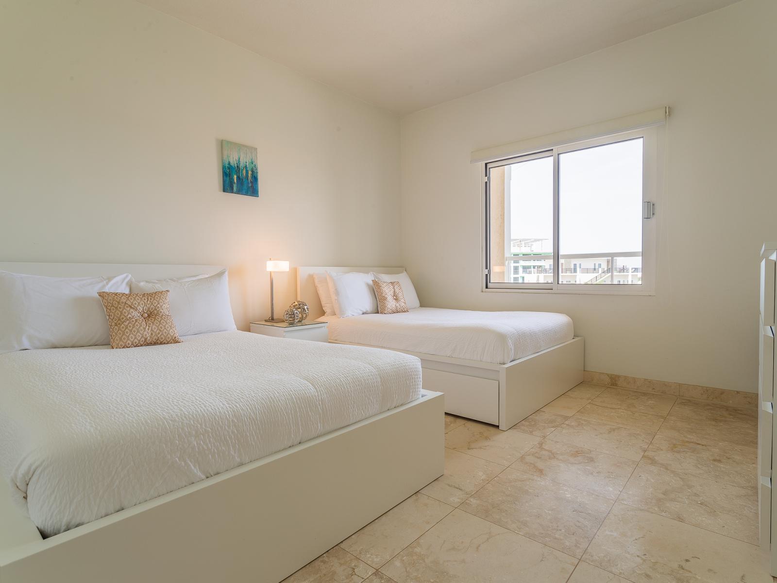 Gorgeous Bedroom of the lovely condo in Oranjestad Aruba - Well-appointed bedroom with neutral tones for a calming atmosphere - Cozy retreat with a plush bed, perfect for relaxation - Bedroom with a cozy ambiance, blending comfort and aesthetics.