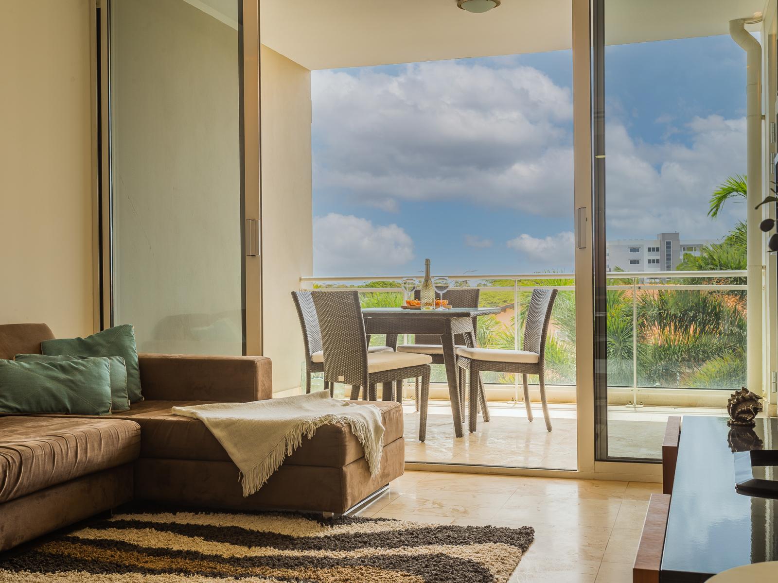 Relax in style in our living room, complete with a TV and seamless access to the balcony. Whether you're unwinding with your favorite show or enjoying the scenic views outside, our cozy yet modern space offers the perfect blend of entertainment and relaxat