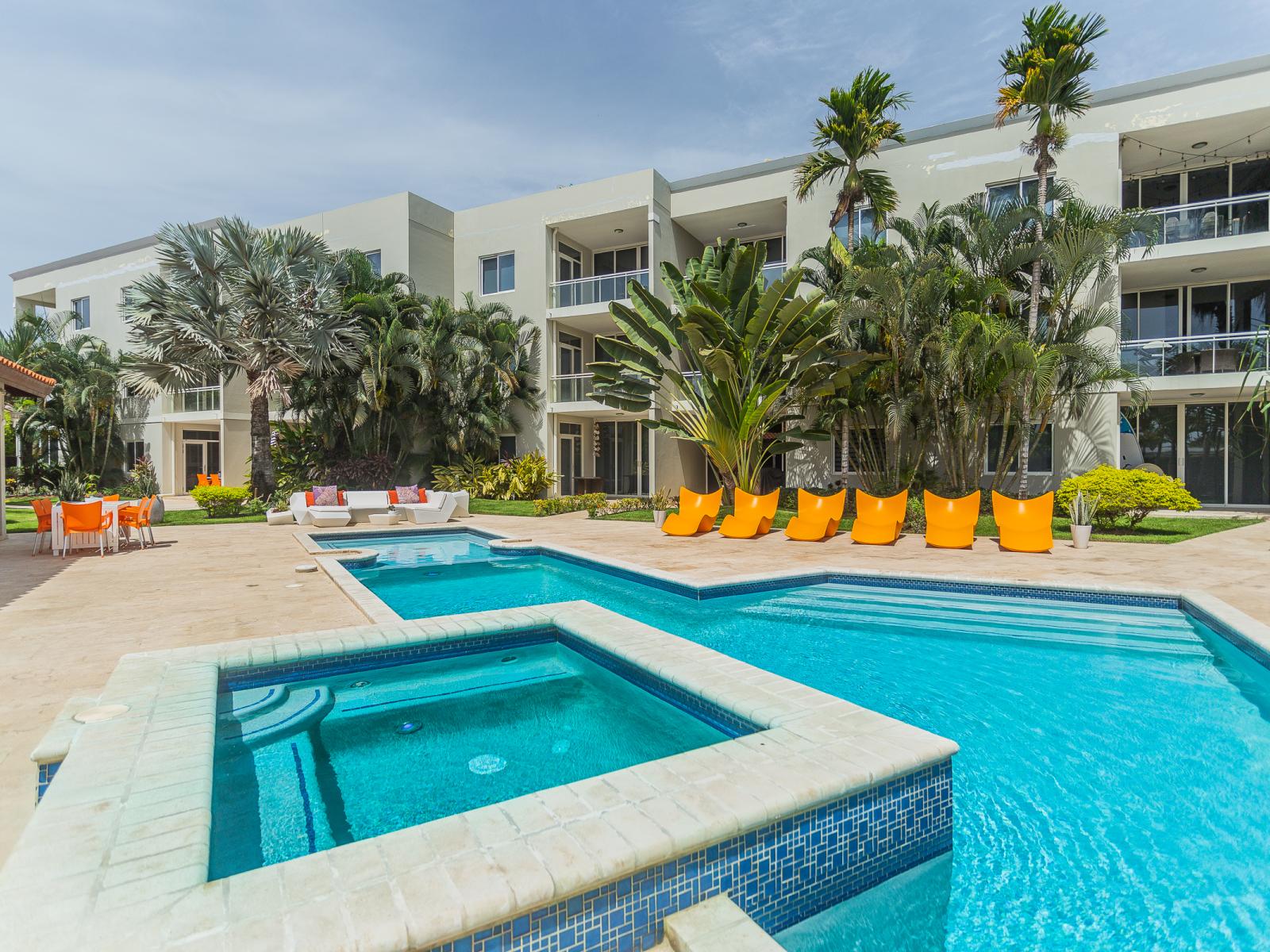 Dive into luxury at our shared pool with a hot tub. Whether you're seeking a refreshing swim or a soothing soak, our tranquil oasis offers the perfect blend of relaxation and rejuvenation.