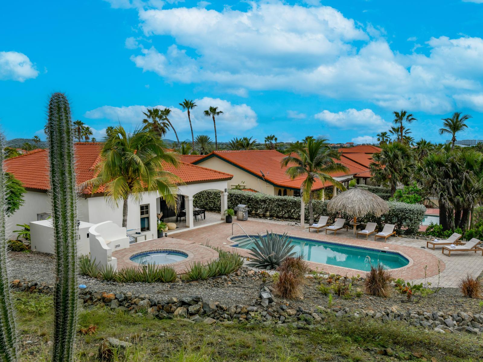 Our expansive backyard features a private pool and hot tub, offering a perfect blend of space and luxury for relaxation and fun.