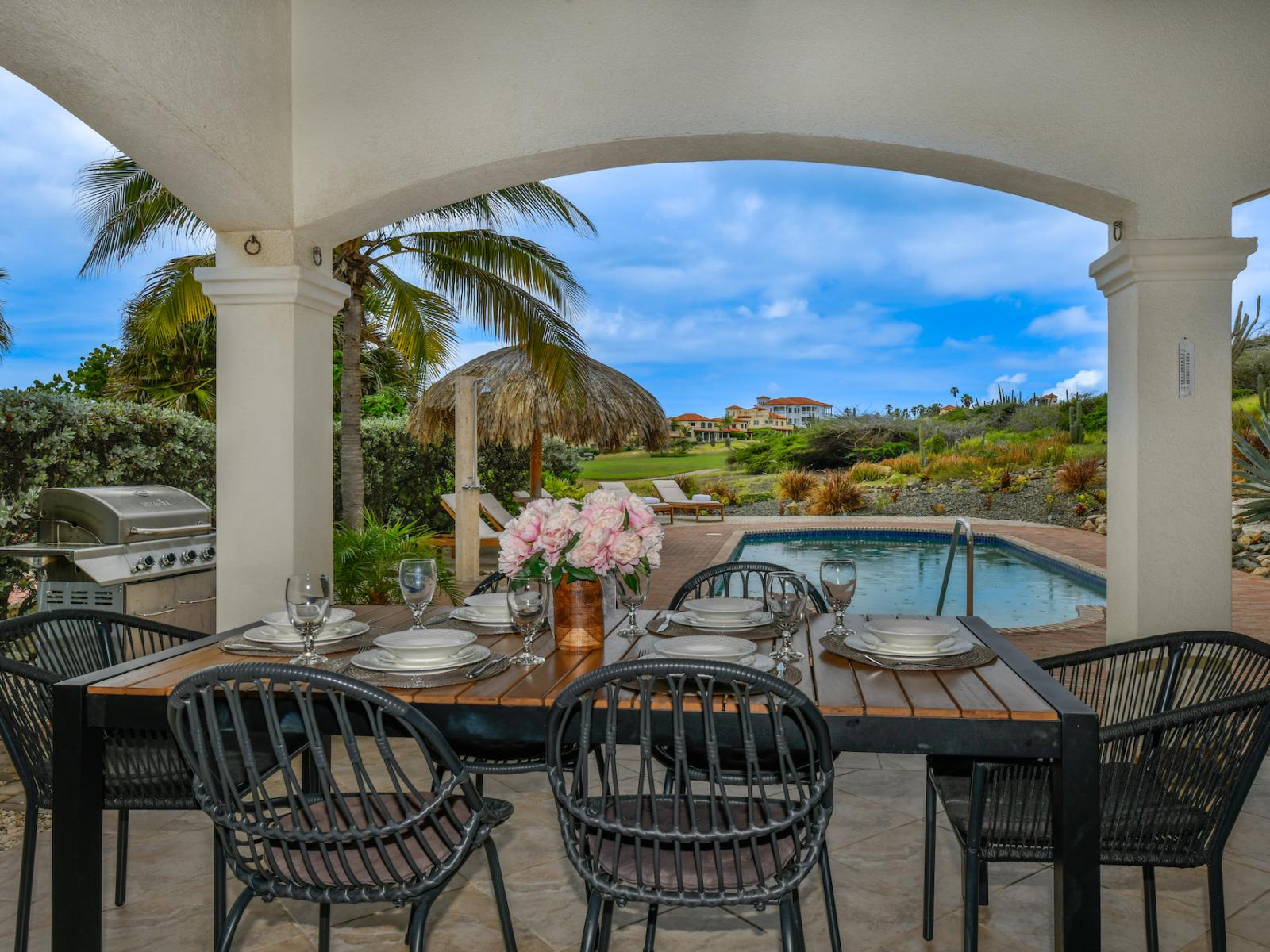 Outside dining table for meals by the pool