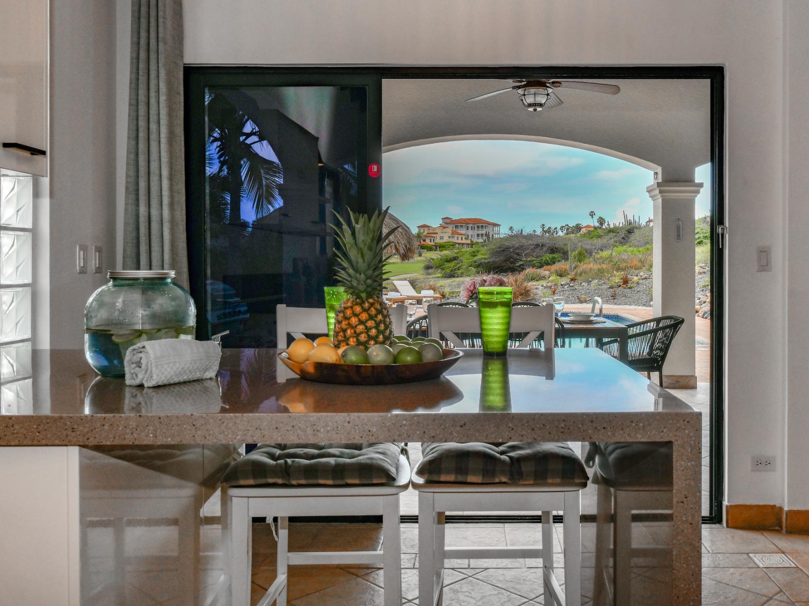 Entertain effortlessly in our open concept kitchen, offering direct access to the patio for al fresco dining.