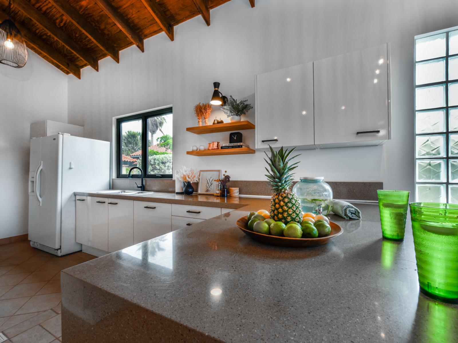 Kitchen features a breakfast bar for quick meals