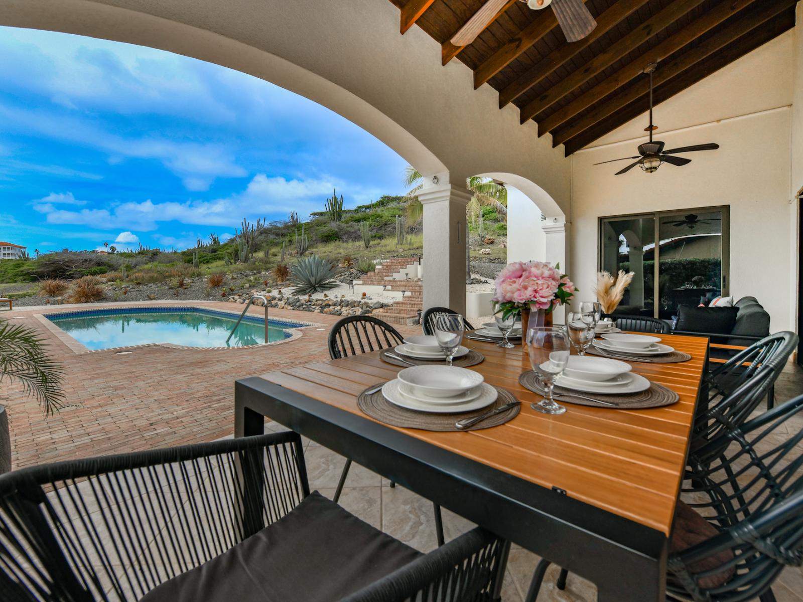 Glorious outdoor dinning area of the villa in Noord, Aruba - Beautiful pool facing outdoor dinning area of the villa - Elite 6 persons dinning - Mesmerizing pool views - Majestic decored space - Refreshing Environment