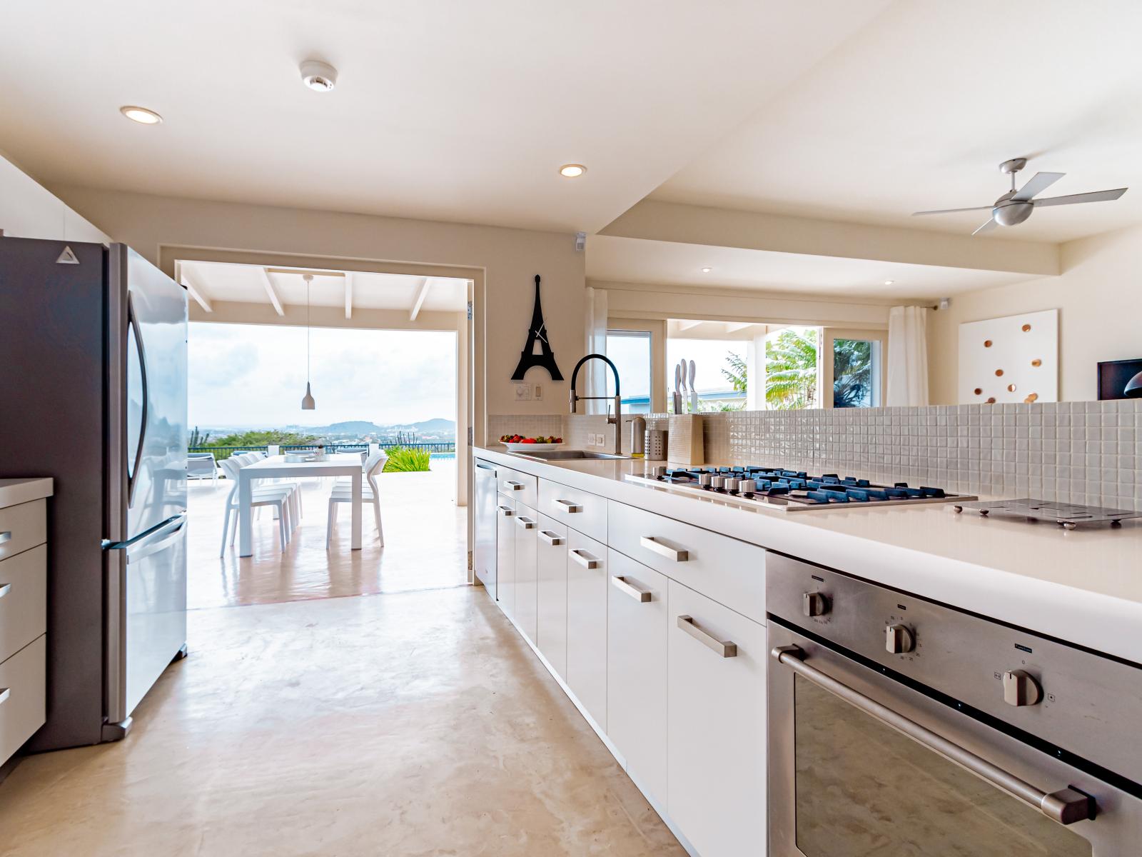 Fully Equipped of the Home in Santa Cruz Aruba - Cook up a storm in our gourmet kitchen - Complete with lush counter space - Top-of-the-line stainless steel appliances - Stylish tile flooring for an unforgettable culinary experience