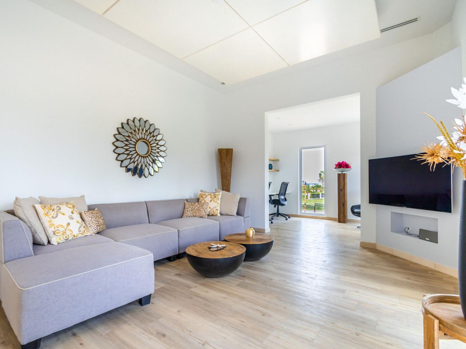 Living room with big couch and tv