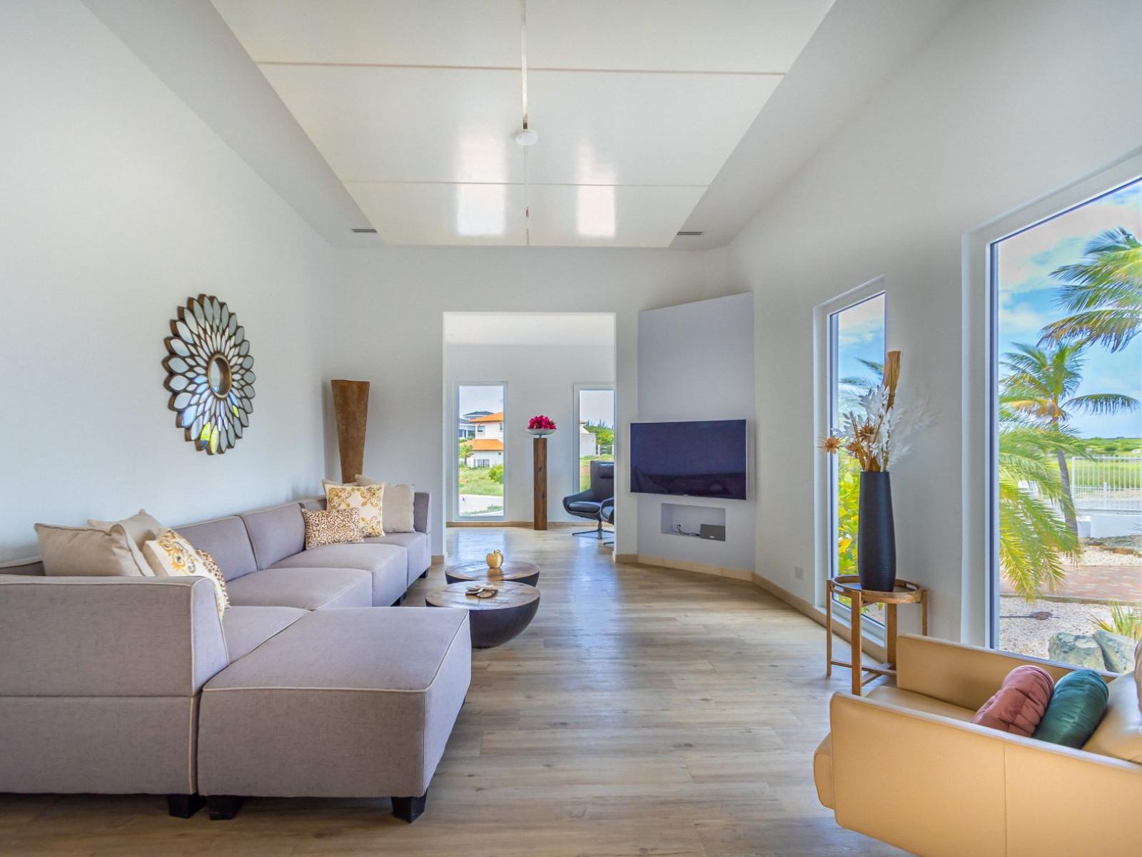 living room is connected to dining area