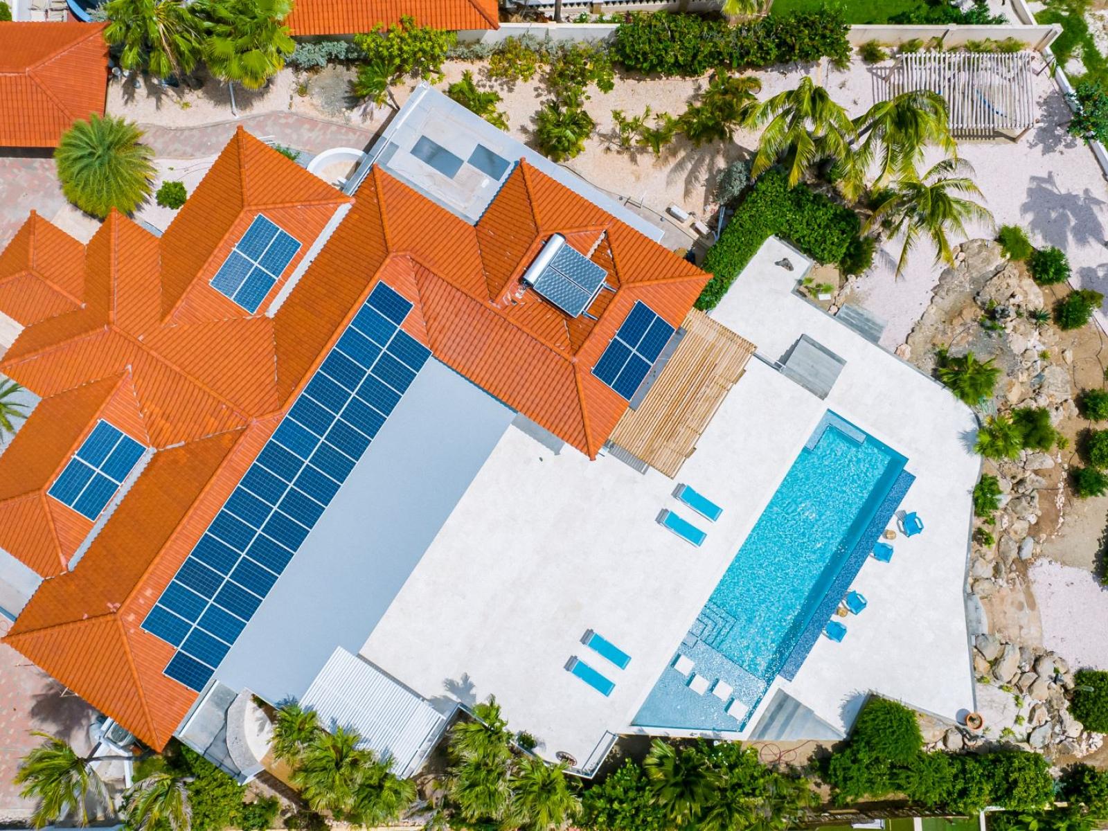 View of the villa and large backyard from above