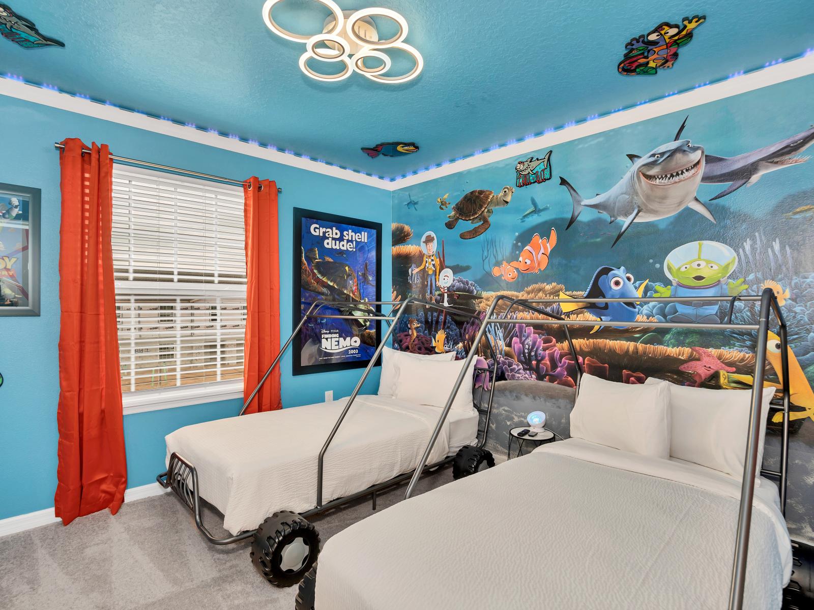 Undersea Adventure: Dive into the Finding Nemo-themed bedroom, where the wonders of the ocean await. With vibrant colors and beloved characters, it's a playful retreat where imaginations swim free and every dream is an undersea adventure.