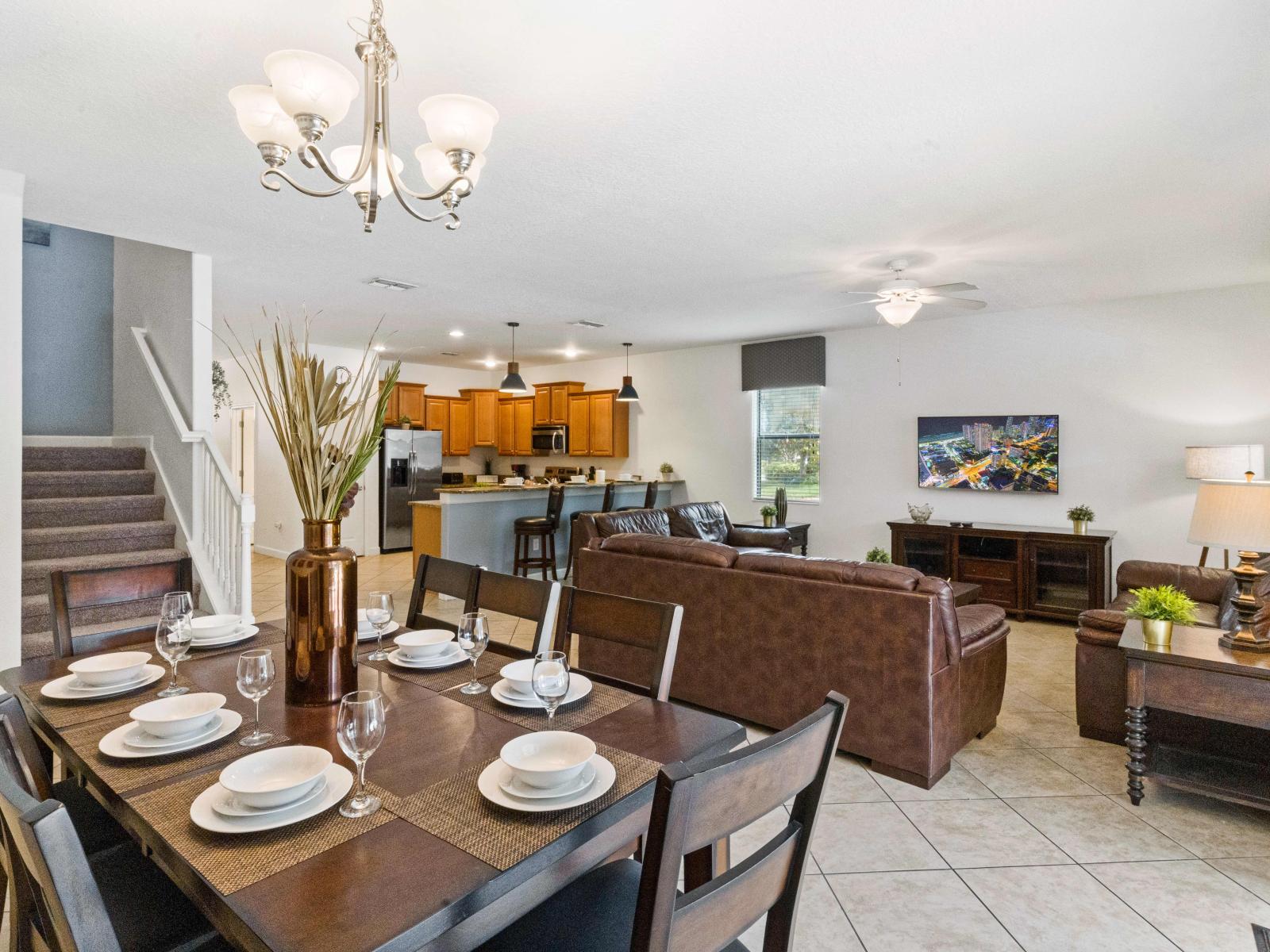 This open concept of entryway to the dining room and living room provides an immediate sense of flow which gives you ample space to move around.