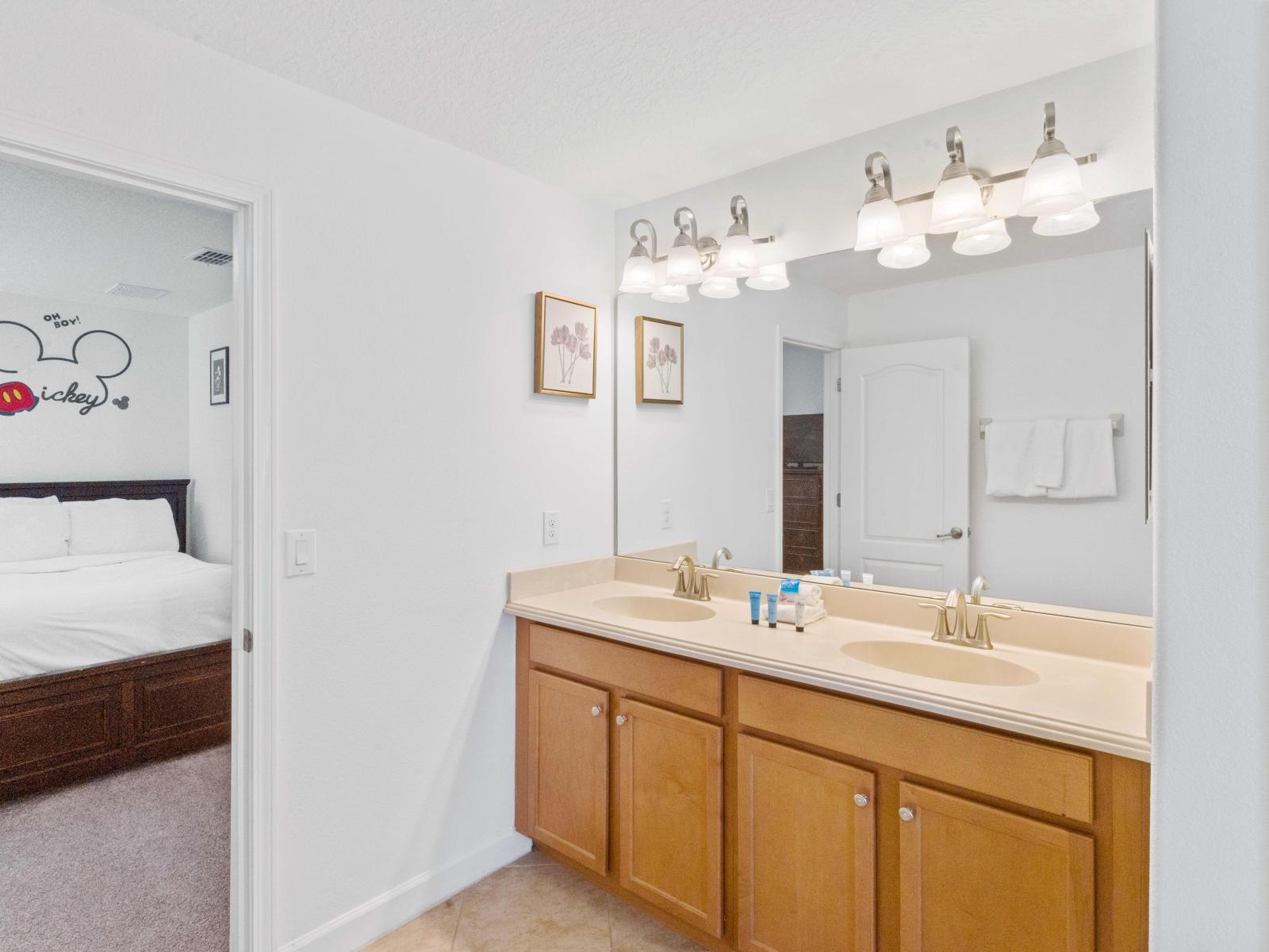 Discover convenience and style in our vanity area, located just steps away from the bedroom, offering a seamless transition for your daily routines.