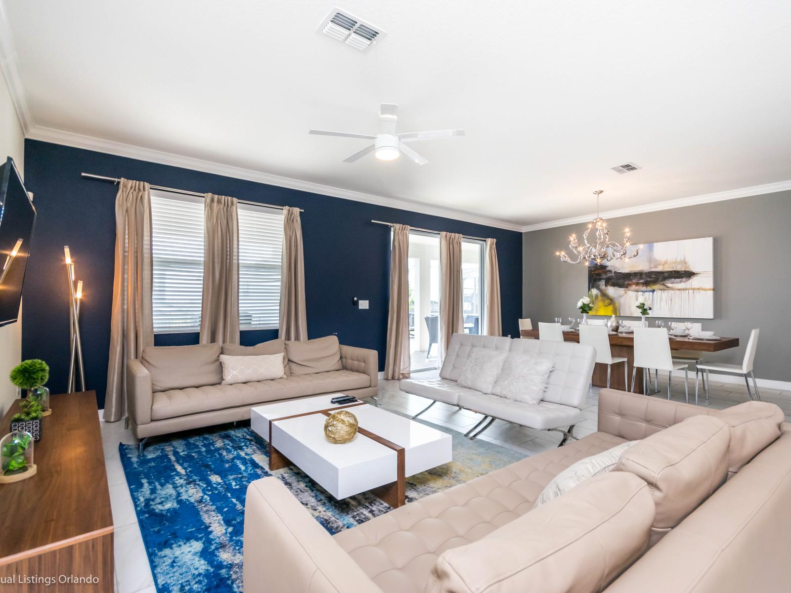 Refreshing Living Area of the Home in Davenport Florida - Smart TV and Netflix - Open-concept living area seamlessly connected to a stylish dining space - Comfy seating