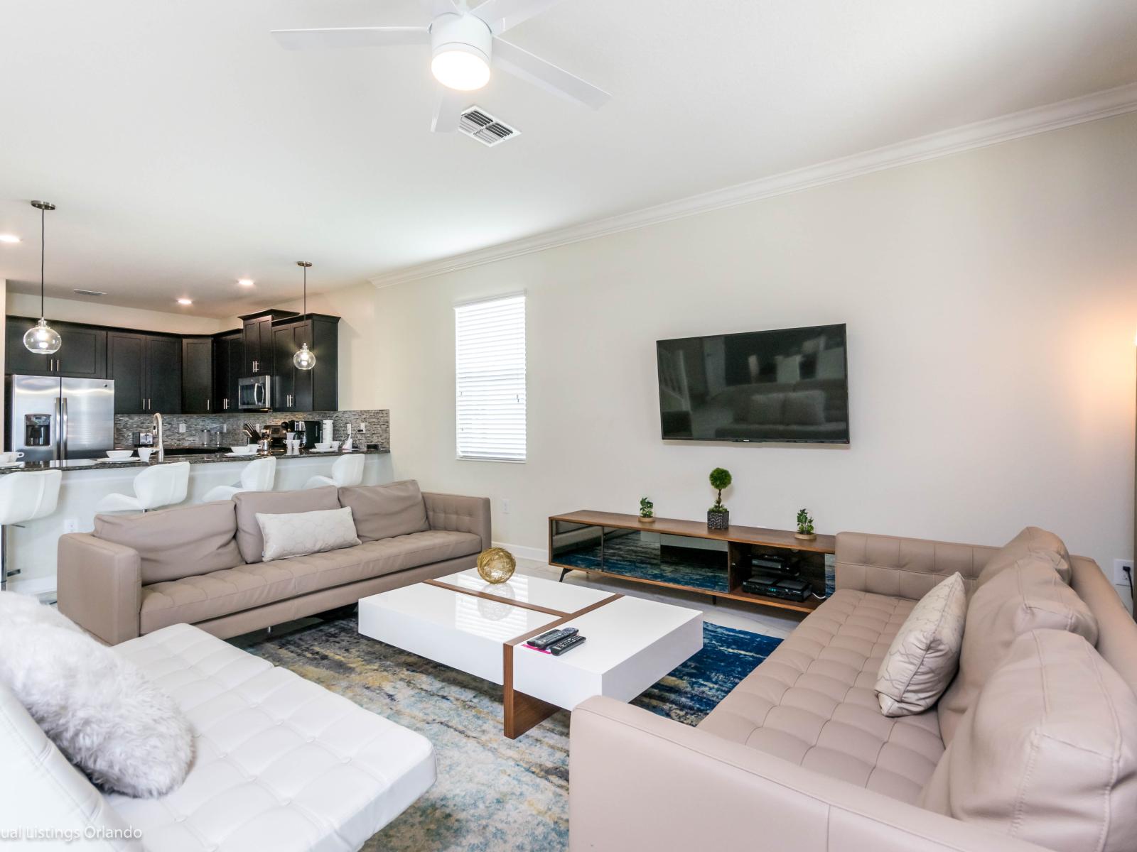 Welcoming Living Area of the Home in Davenport Florida - Plush seating arrangements invite relaxation and stylish gatherings - Smart TV and Netflix - Well-chosen lighting fixtures adding both functionality and charm