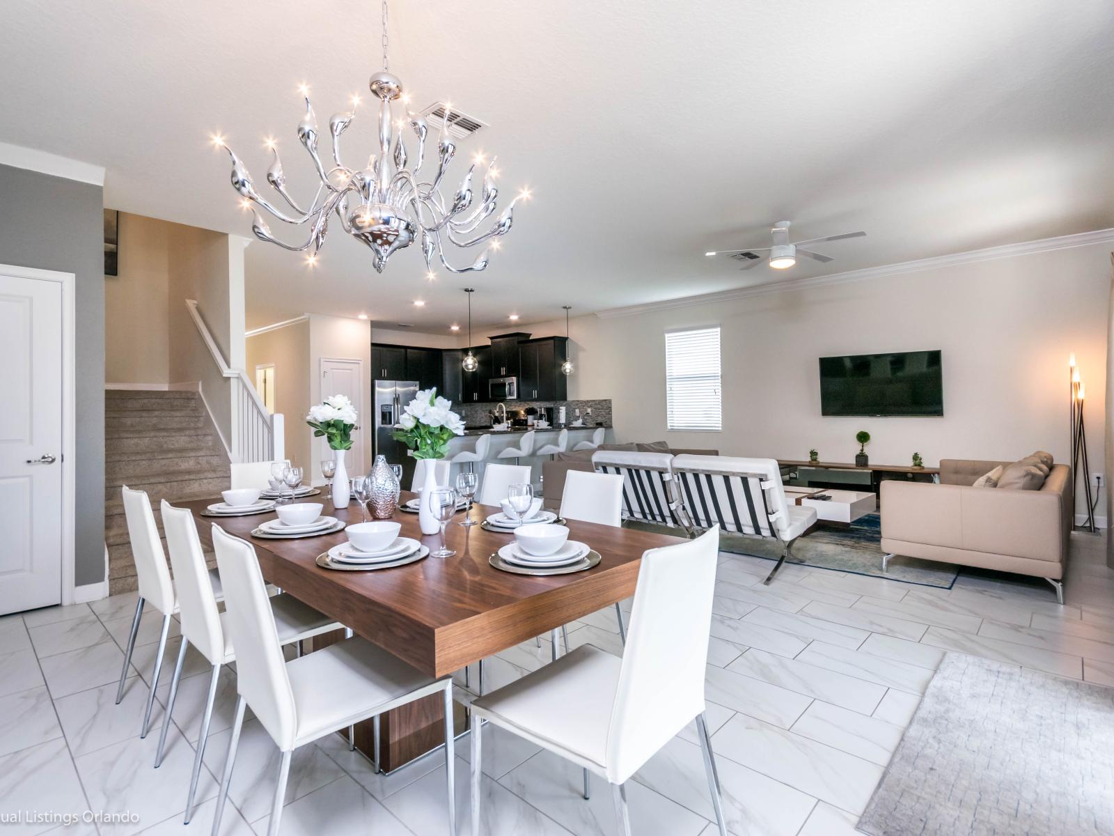 Elegant Dining Area of the Home in Davenport Florida - The dining area exudes charm and warmth - Offering cozy setting to enjoy delicious meals and lively conversations - With comfortable seating and tasteful decor - 8 Persons Dining