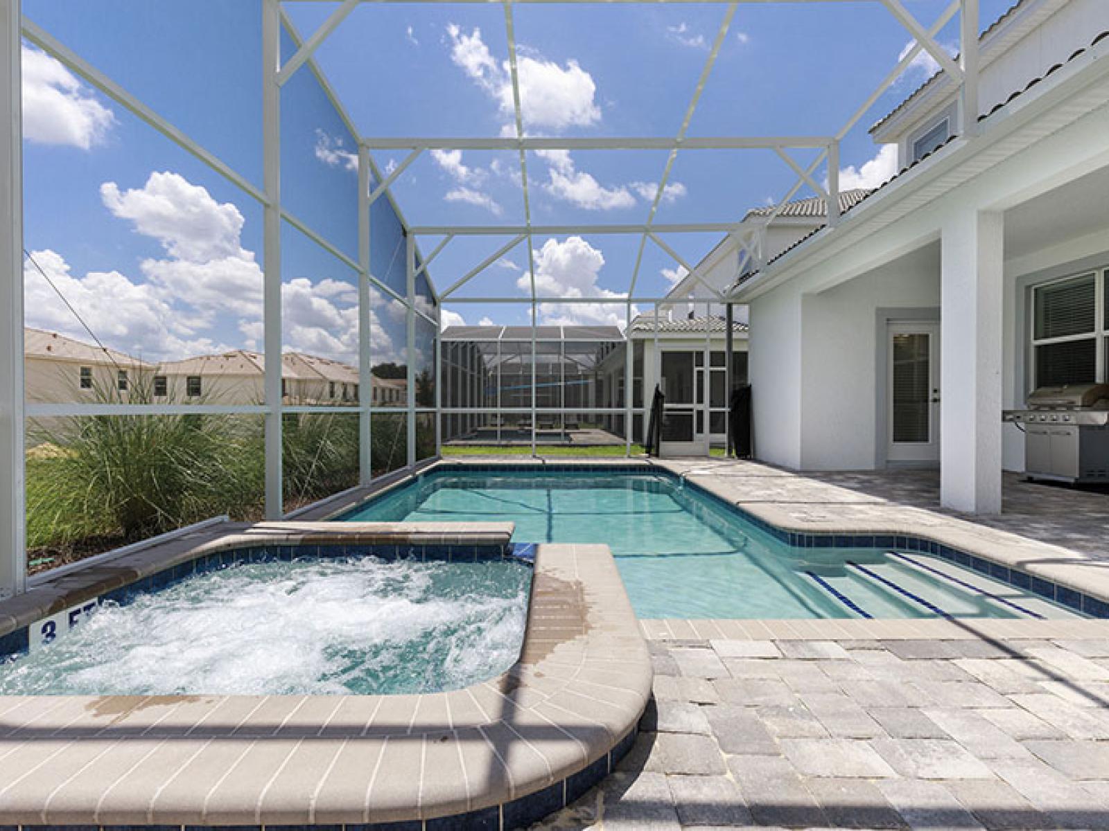 Stunning Private Pool of the Home in Davenport Florida - Relax by the shimmering poolside oasis - Dive into a refreshing poolside escape - Enjoy leisurely moments in inviting pool area