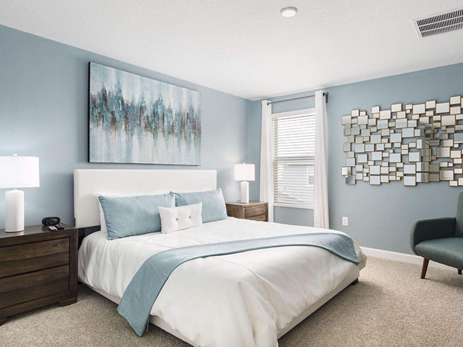 Modern Bedroom of the Home in Davenport Florida - Indulge in the luxurious comfort of  - Exuding hotel-like vibes that promise a restful and rejuvenating stay - Stunning Decor and cozy seating