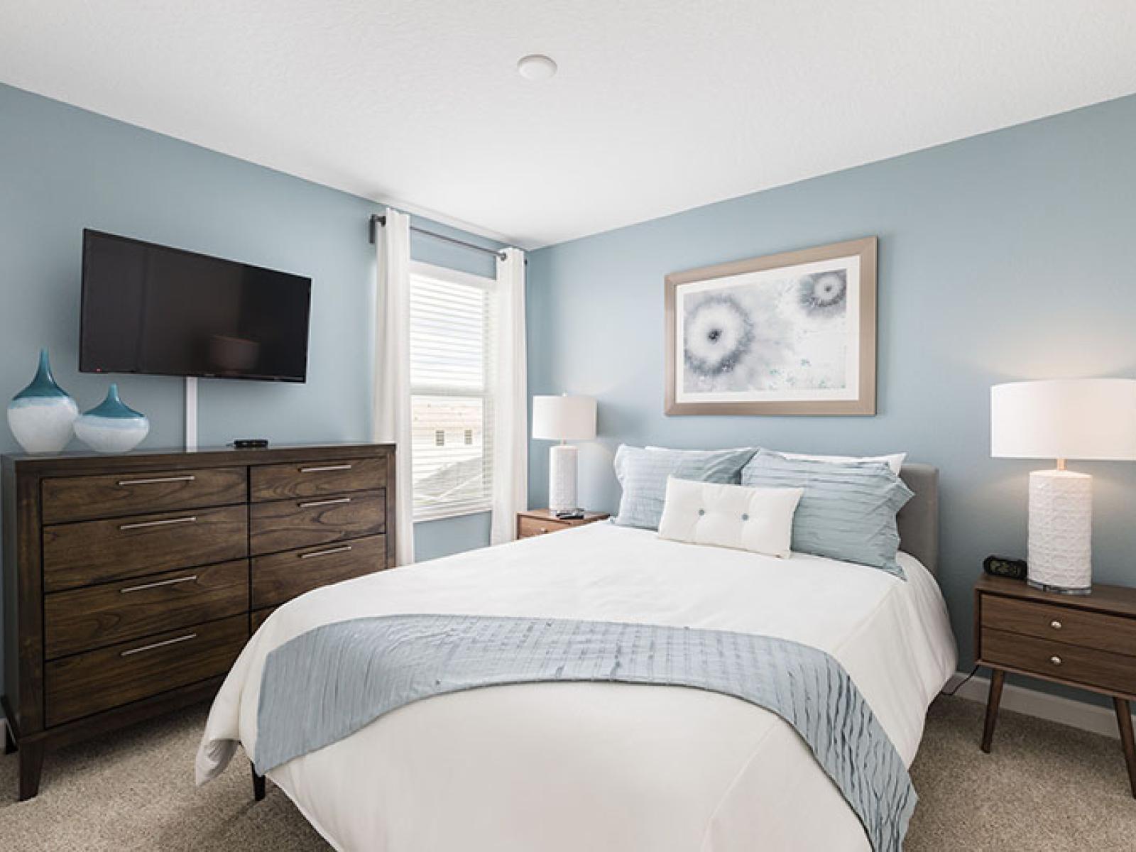 Elegant Bedroom of the Home in Davenport Florida - High-end furnishings and designer touches - Sumptuous bedding and luxurious linens - A serene escape where you can indulge in ultimate comfort - Smart TV and Netflix