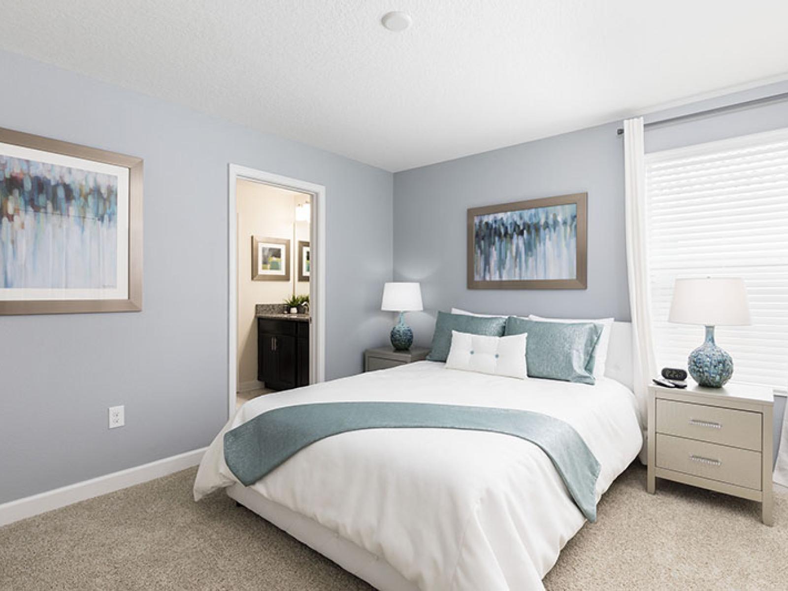 Pompous Bedroom of the Home in Davenport Florida - Features comfy double bed - Cozy retreat with a plush bed, perfect for relaxation - Spacious bedroom offering comfort and style