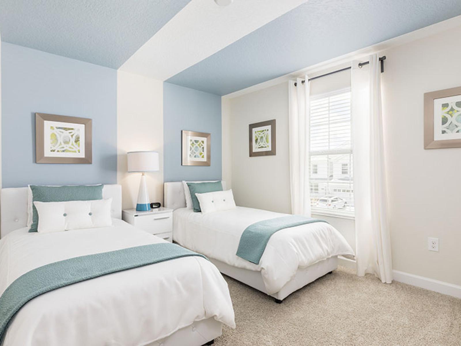 Cozy Bedroom of the Home in Davenport Florida - Retreat to our charming two-bed offering comfort and relaxation for a restful night's sleep - A serene space where you can relax and rejuvenate - Stylish decor and modern furnishings