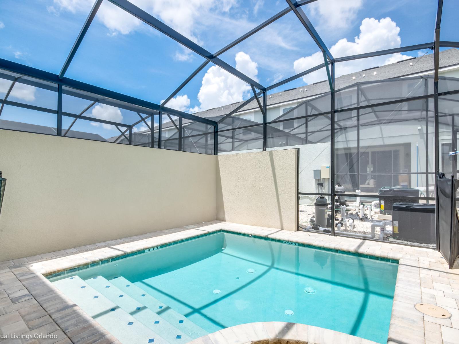 - Splendid Shared Pool of the Apartment in Kissimmee - Cosy beach chairs available - Dive into refreshing poolside escape - Immerse yourself in the cool elegance of our pool - Experience ultimate relaxation in our poolside paradise