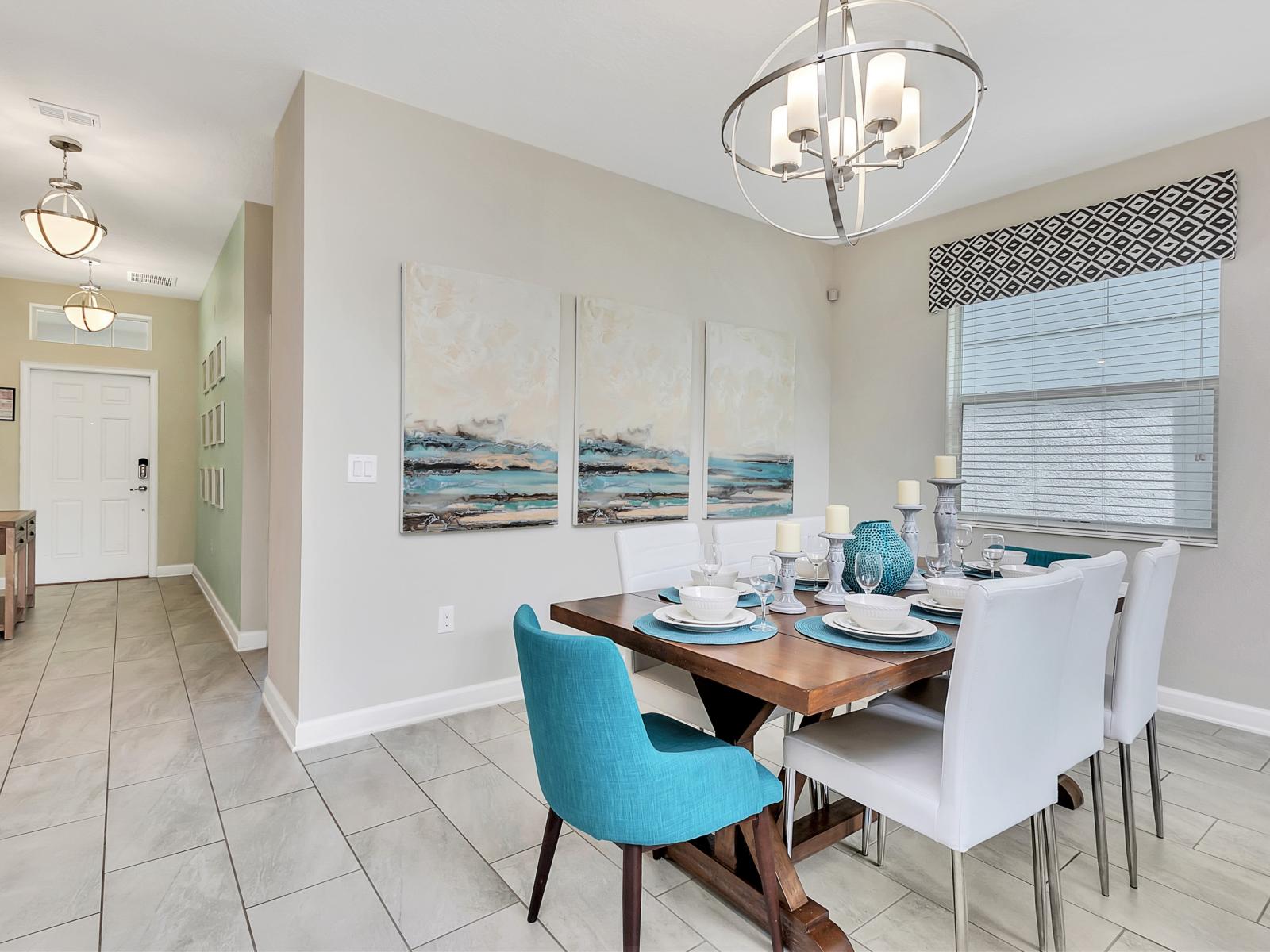 Posh Dining Area of the Home in Davenport Florida - Chic dining area featuring a stylish table and seating - Artfully arranged table settings for a touch of elegance - Customized decor reflecting a sophisticated design sensibility