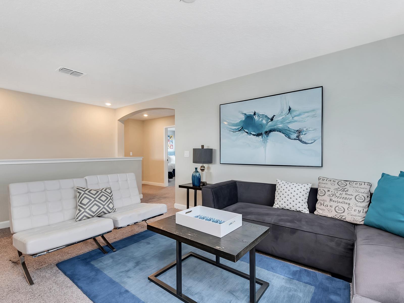 Luxurious Living Area of the Home in Davenport Florida - A balance of sophistication and comfort, featuring elegant yet inviting furniture - Smart TV and Netflix - High-end finishes and refined details