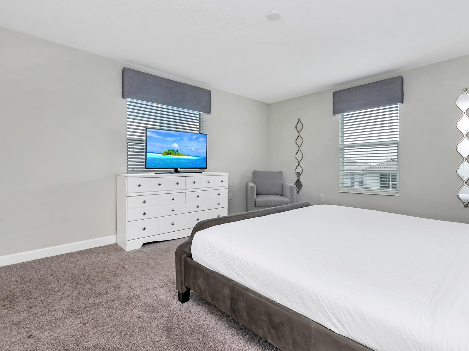 Deluxe Bedroom of the Home in Davenport Florida - Smart TV and Netflix - Clean lines and minimalist design for a calming atmosphere - Cozy vibe with double bed - A serene space where you can relax and rejuvenate